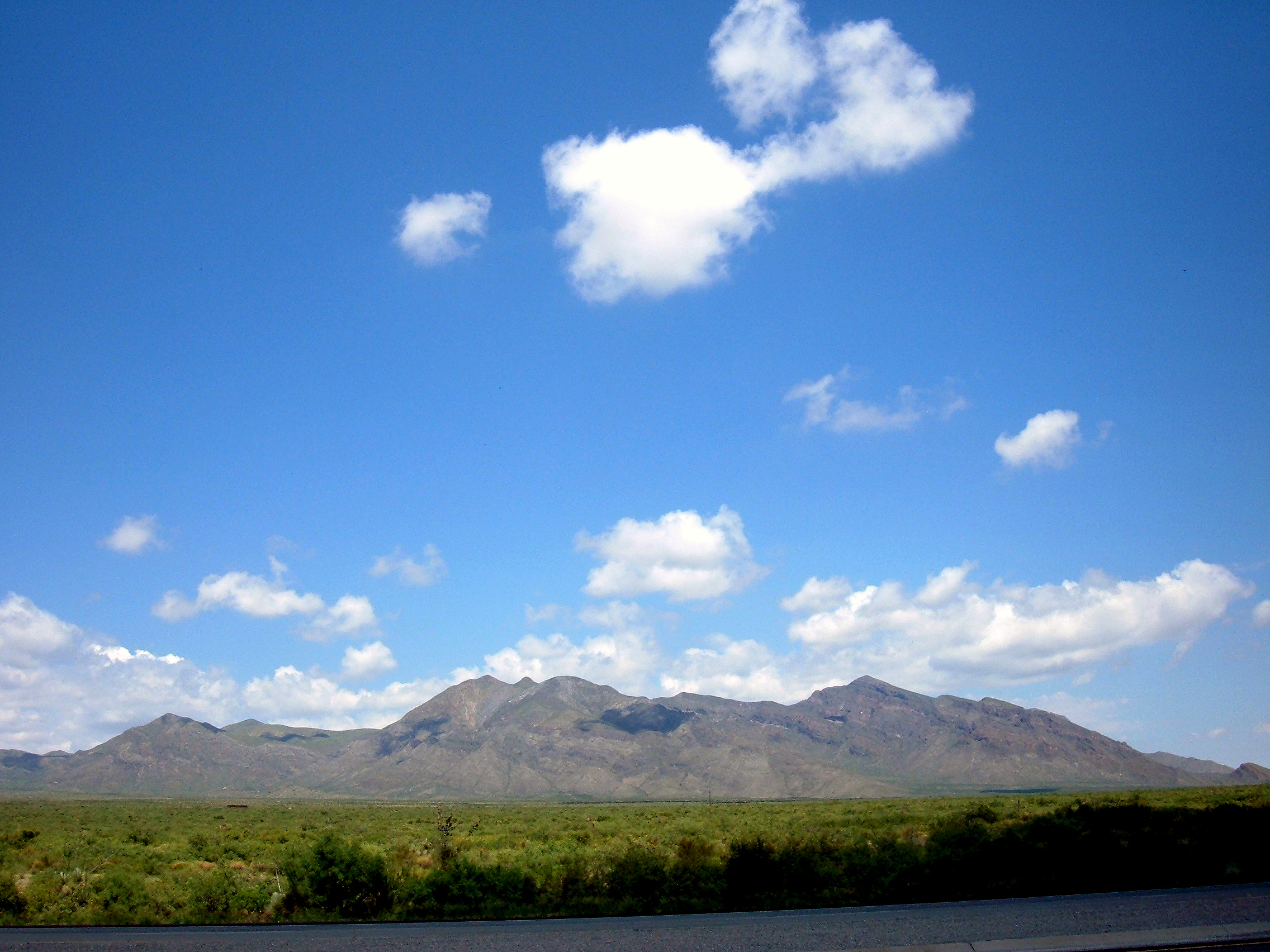 Eastern view of the San Andres Mountains near Las Cruces, New Mexico. Photographed from US Highway 70 about two miles east of the White Sands Missile Range headquarters.