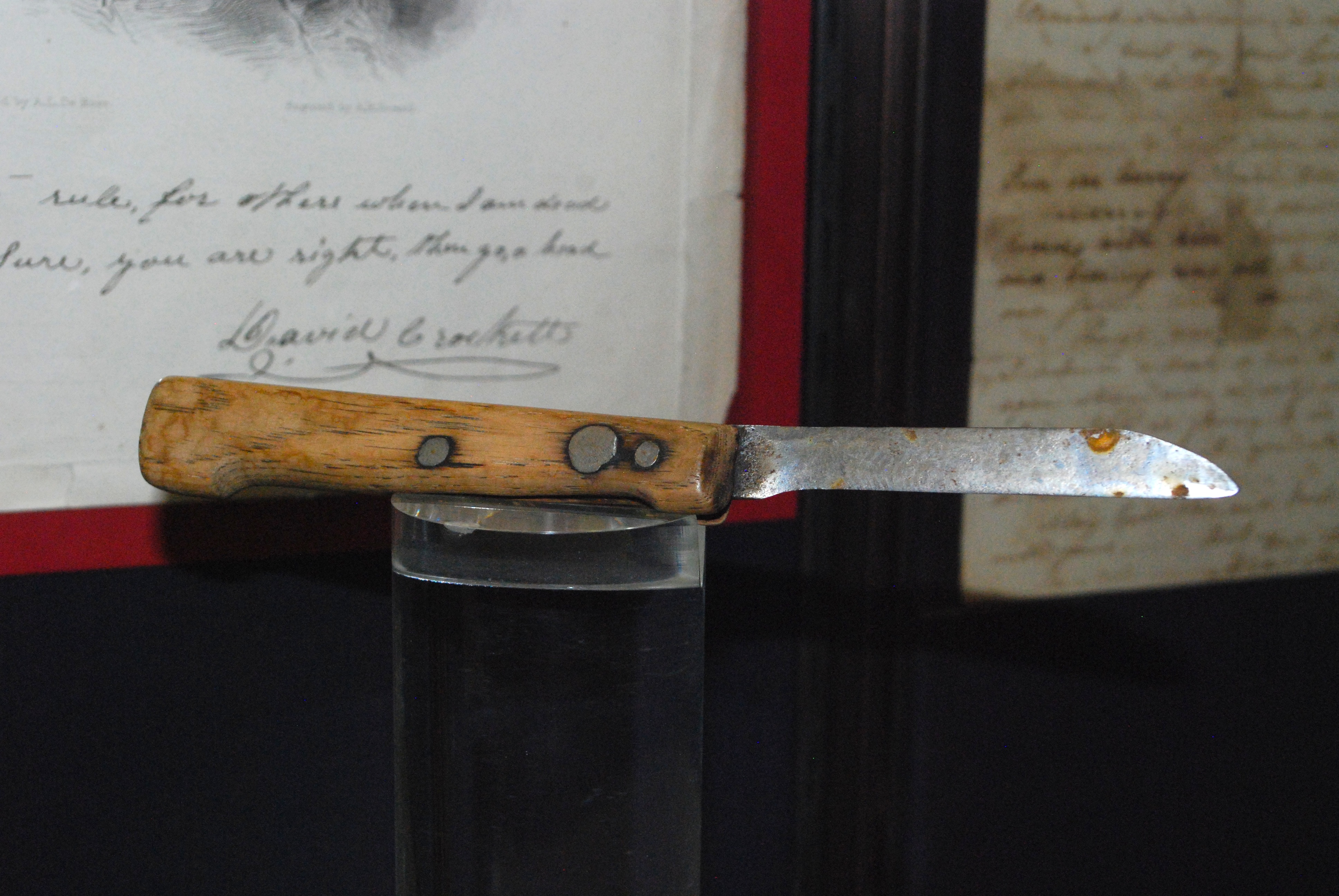 A knife formerly owned and used by Davy Crockett during the Battle of the Alamo on display in the San Jacinto Museum of History at the San Jacinto Battleground State Historic Site in Harris County, Texas.
According to the museum, after Crockett's death during the battle, Andrea Castañón Villanueva (also known as "Madam Candelaria") took the knife, and later gave it to Juan L. Lynn, who then gave it to Sion Record Bostick.  Bostick, himself, fought during the Texas Revolution in the Battle of San Jacinto.