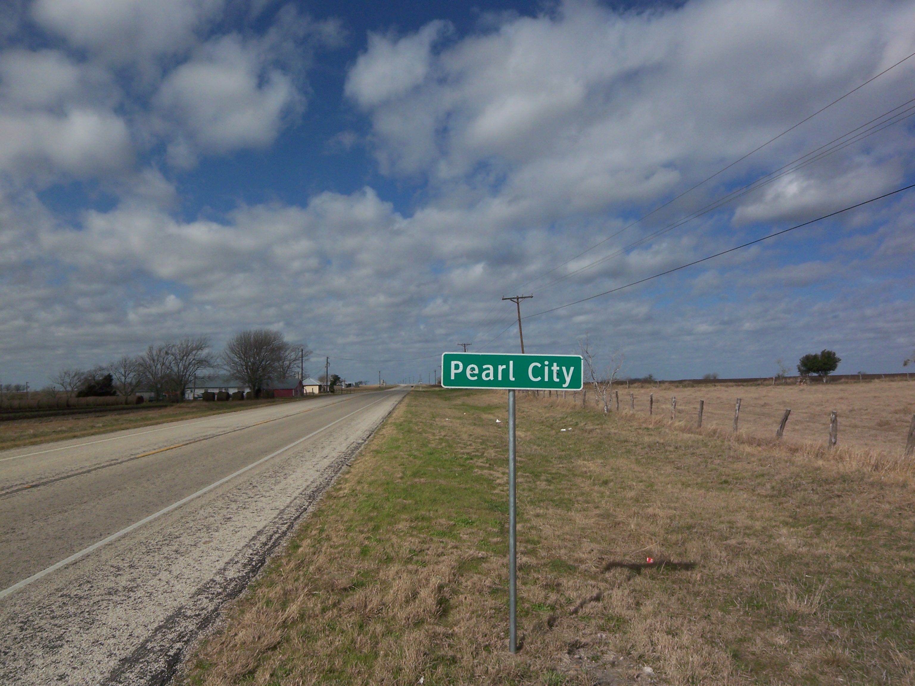 Town marker for Pearl City, Texas. Pearl City was named after the Pearl Brewing Company's Pearl beer. Pearl City isn't a city at all, instead just a small community West of Yoakum.