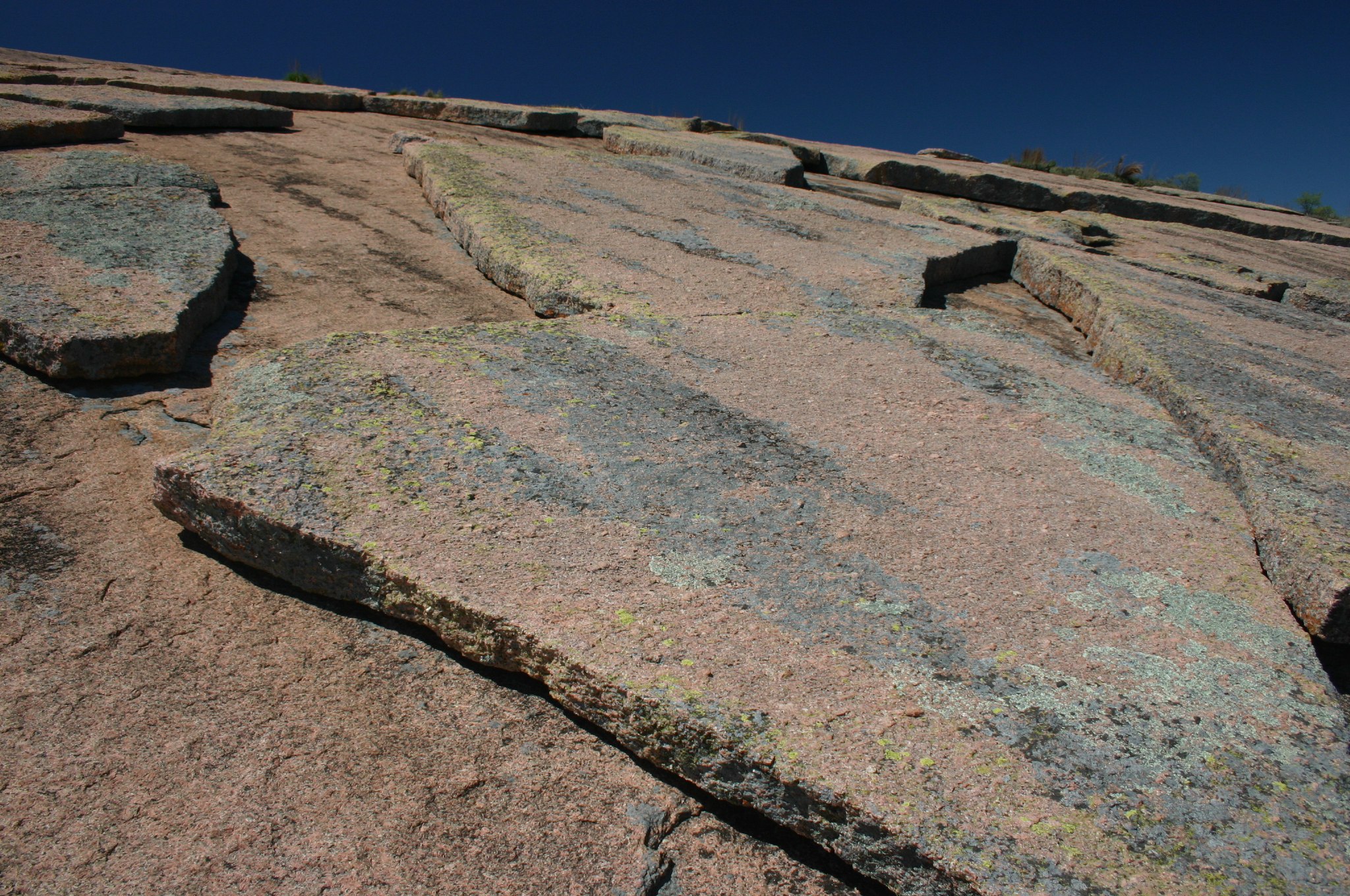 Geological exfoliation of granite dome rock in the Enchanted Rock State Natural Area, Texas, USA.