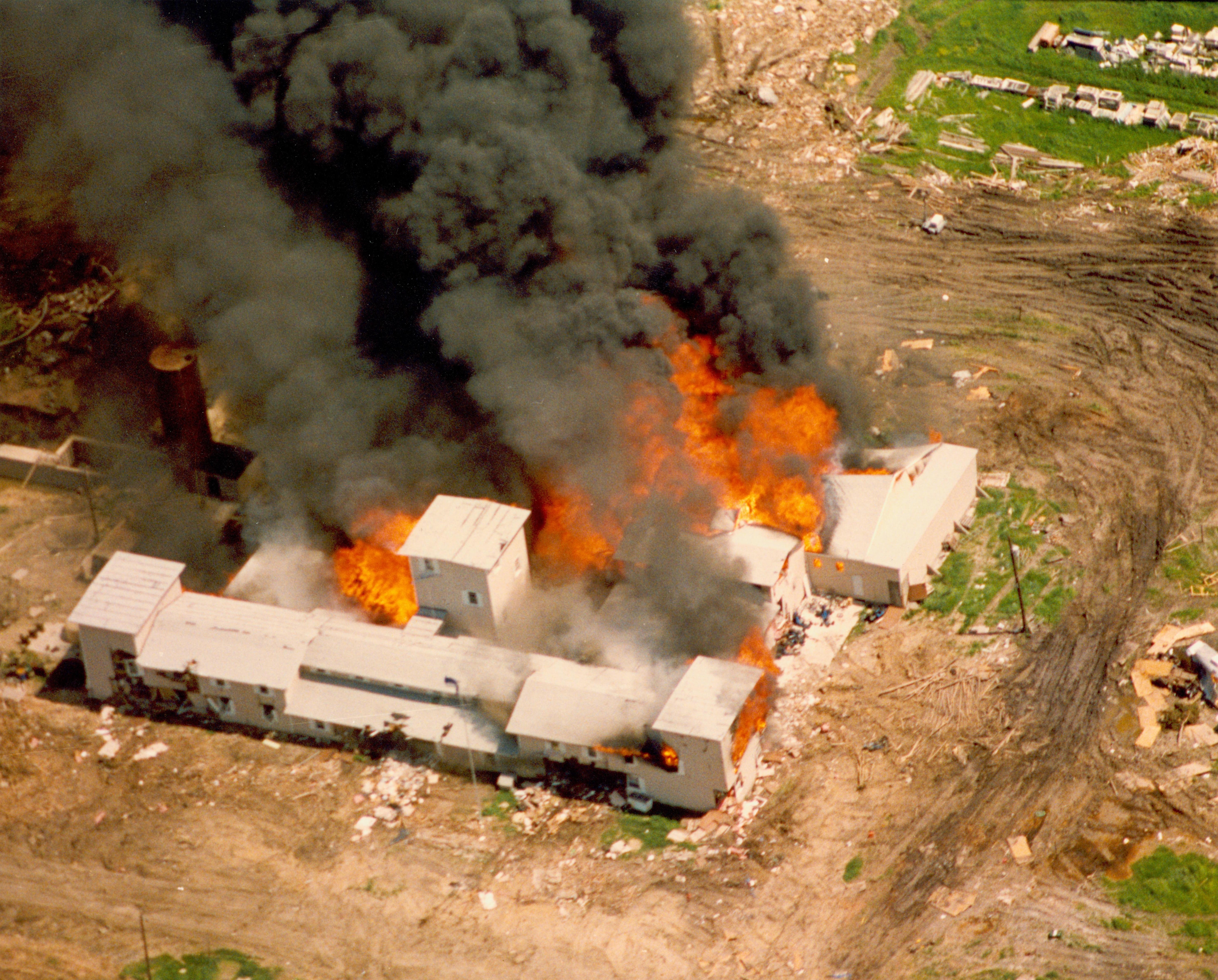 Aerial view of Branch Davidian compound near Waco, Texas, in flames on April 19, 1993, following a 51-day siege by the FBI and law enforcement.