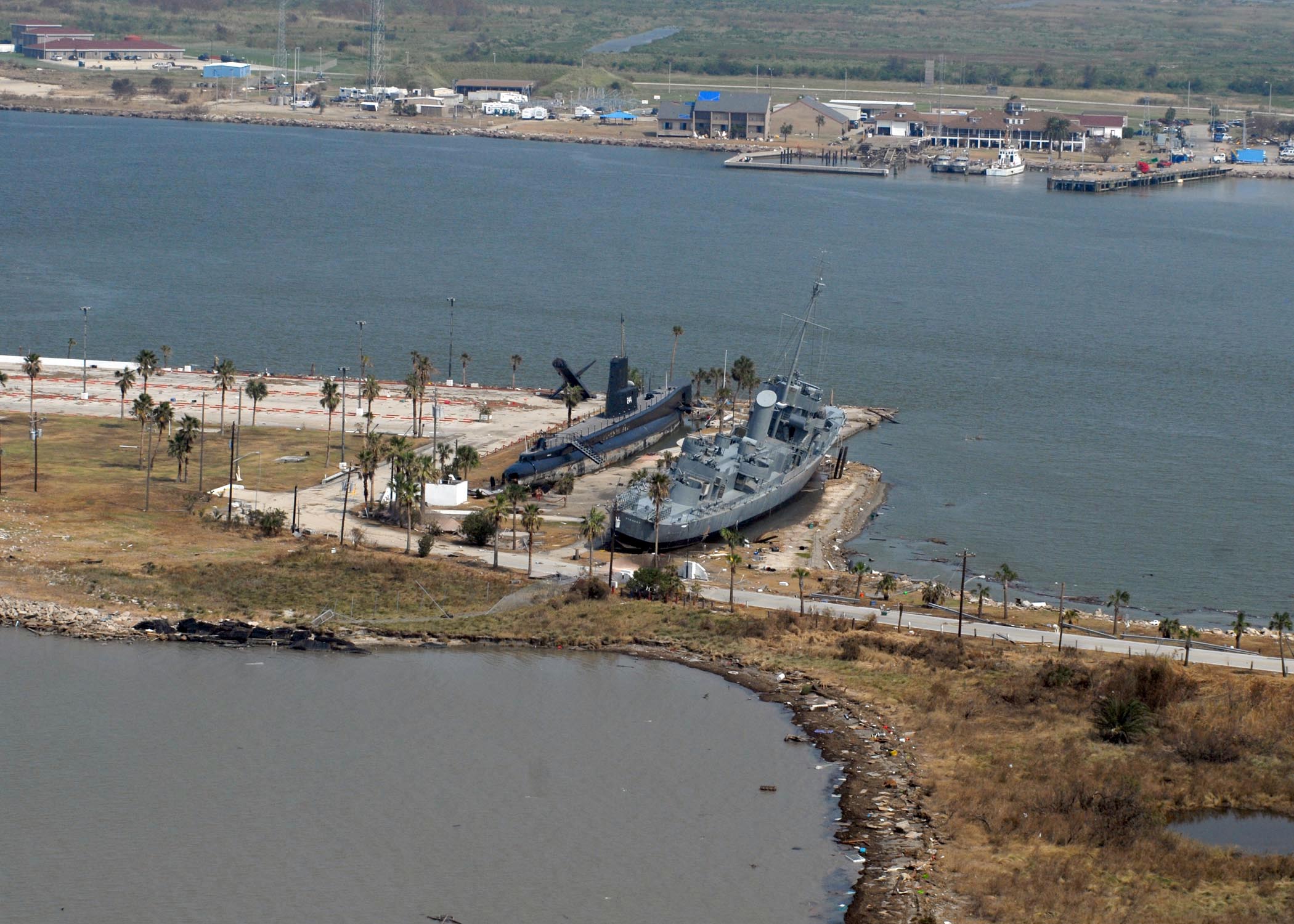 080919-N-6575H-603 GALVESTON, Texas (Sept. 19, 2008) The Edsall-class destroyer escort USS Stewart (DE-238) and the Gato-class submarine USS Cavalla (SS-244), both museum display ships at Seawolf Park on Pelican Island in Galveston, Texas, incurred little damage during Hurricane Ike. (U.S. Navy photo by Chief Mass Communication Specialist Chris Hoffpauir/Released)
