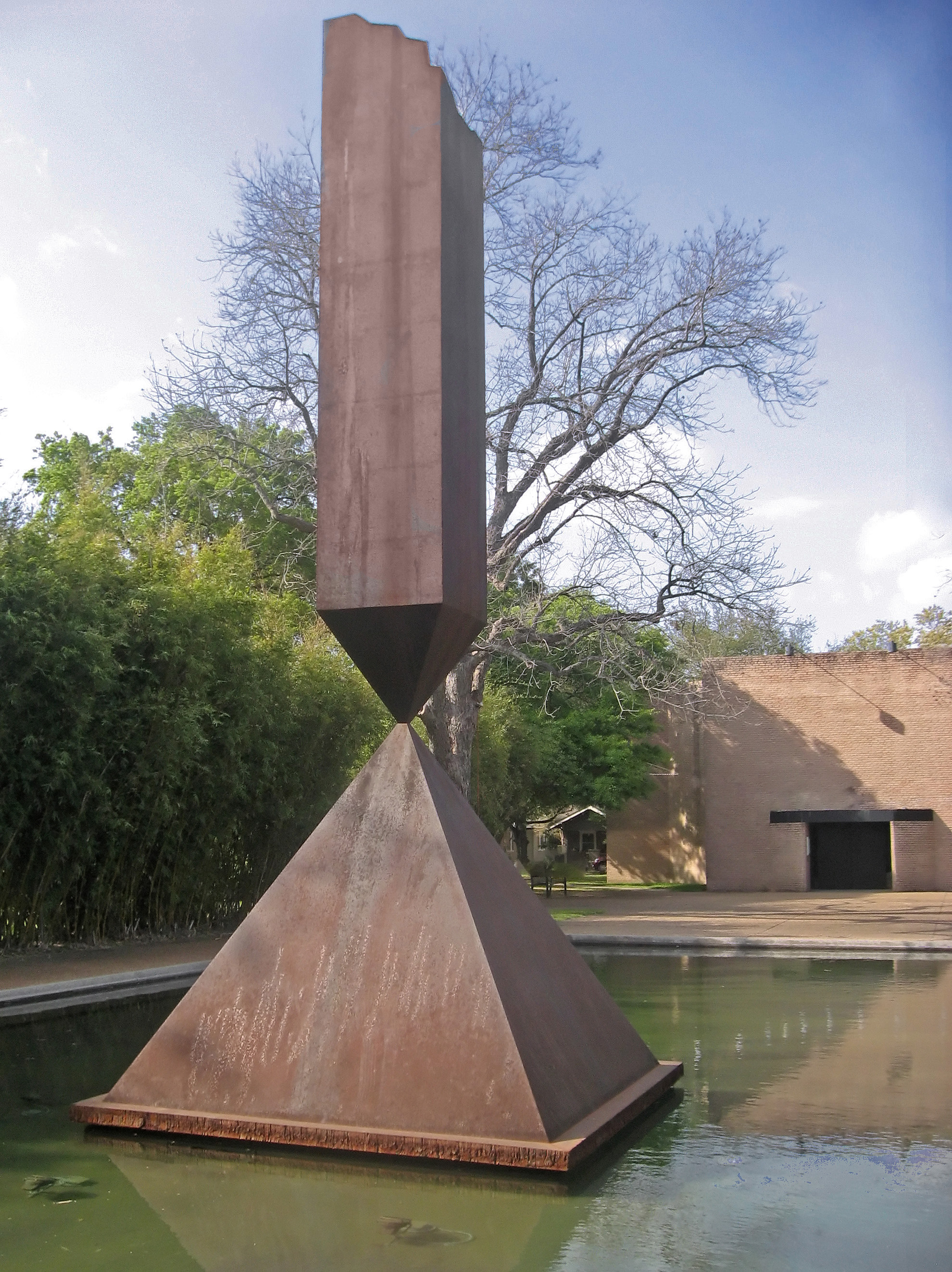 Broken Obelisk in front of the Rothko Chapel in Houston, Texas.  The Chapel is on the National Register of Historic Places