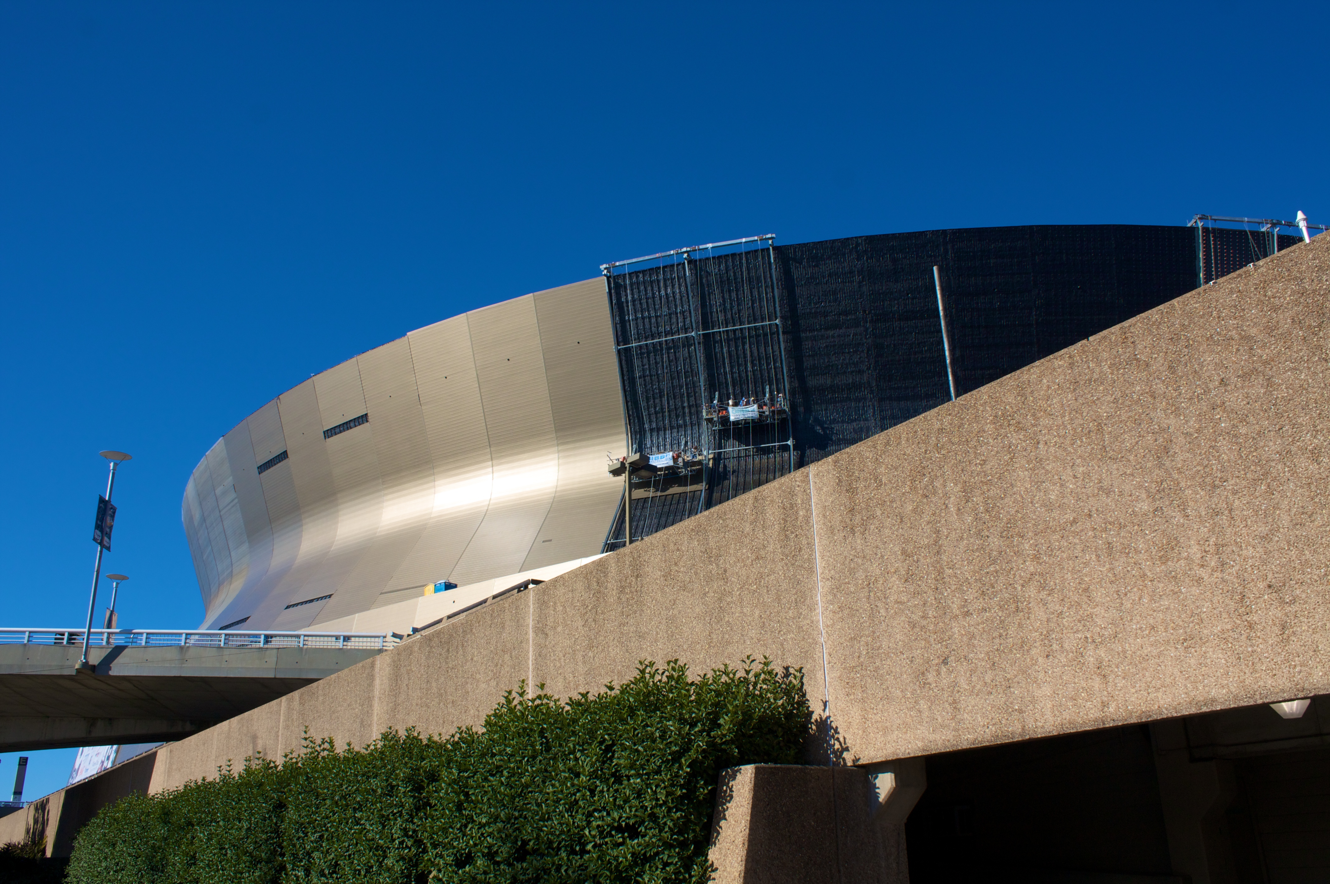 The Louisiana Superdome getting its siding replaced in January 2010.