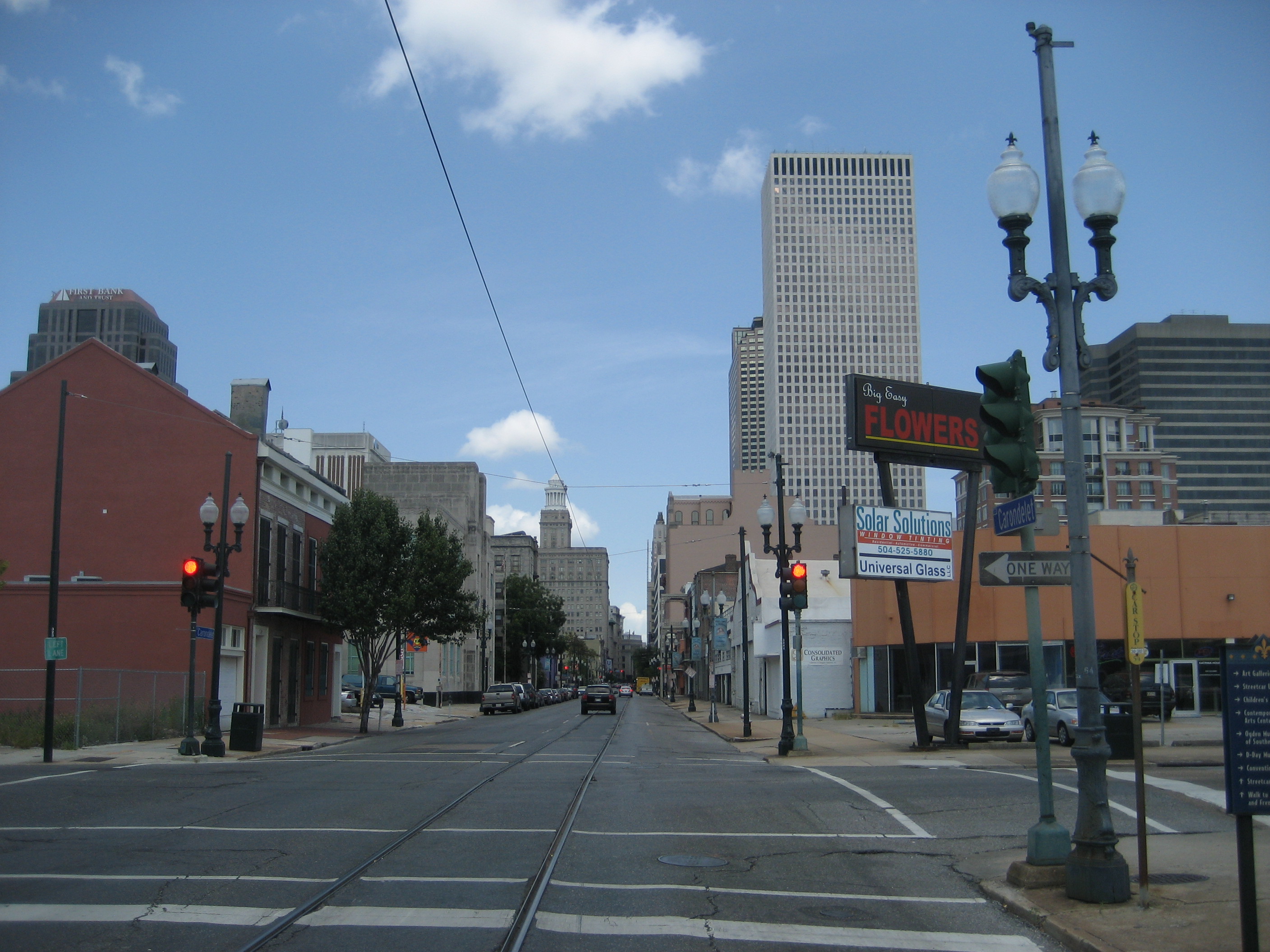 Carondelet Street, New Orleans Central Business District, looking down river with view of Hibernia Bank tower and One Shell Square buildings.