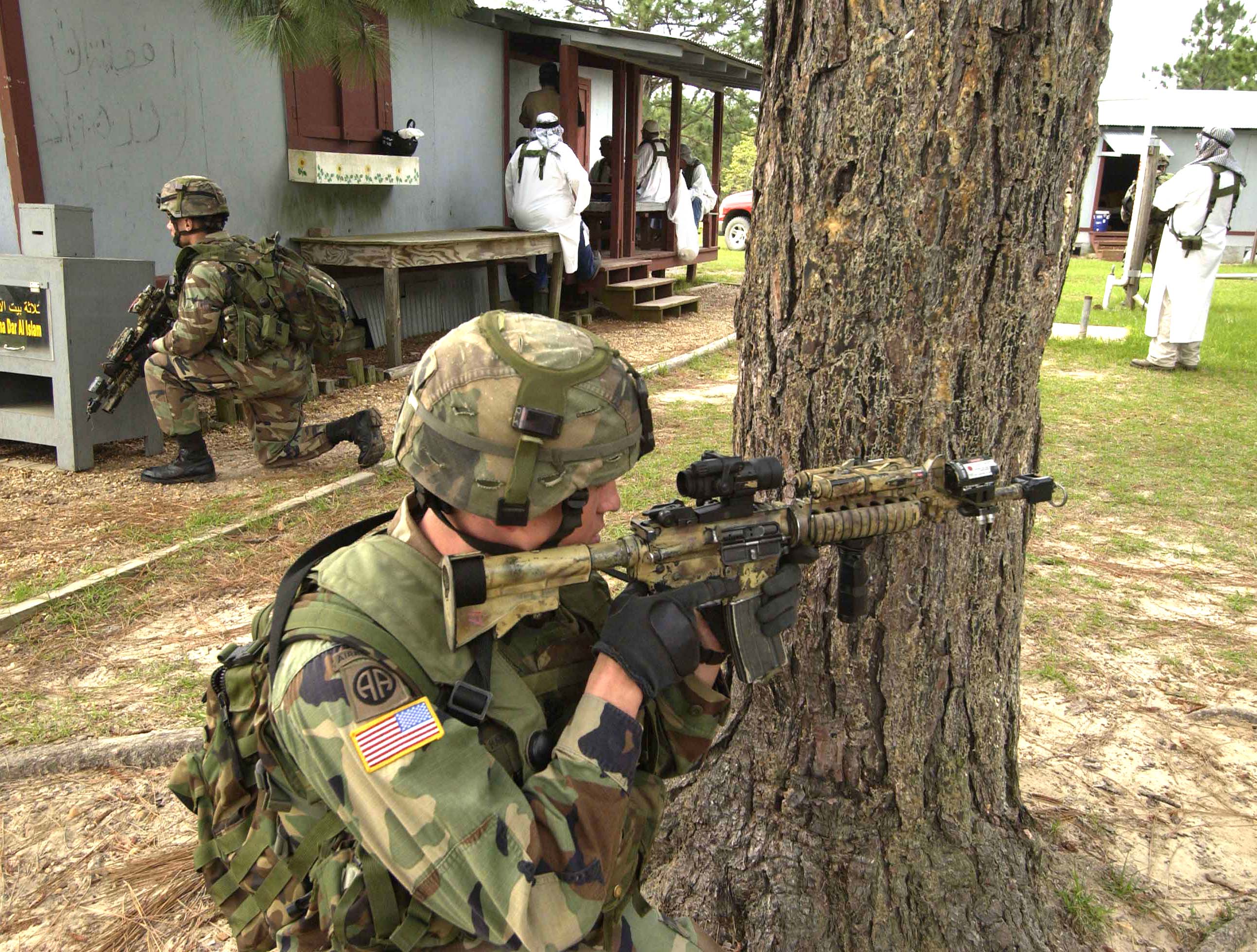 Spc. Alexander Sheffield, from the 505th Parachute Infantry Regiment, 82nd Airborne Division, and a fellow soldier participate in an exercise in a simulated Iraqi village at the Joint Readiness Training Center, Fort Polk, Louisiana, in preparation for an upcoming deployment to Iraq.