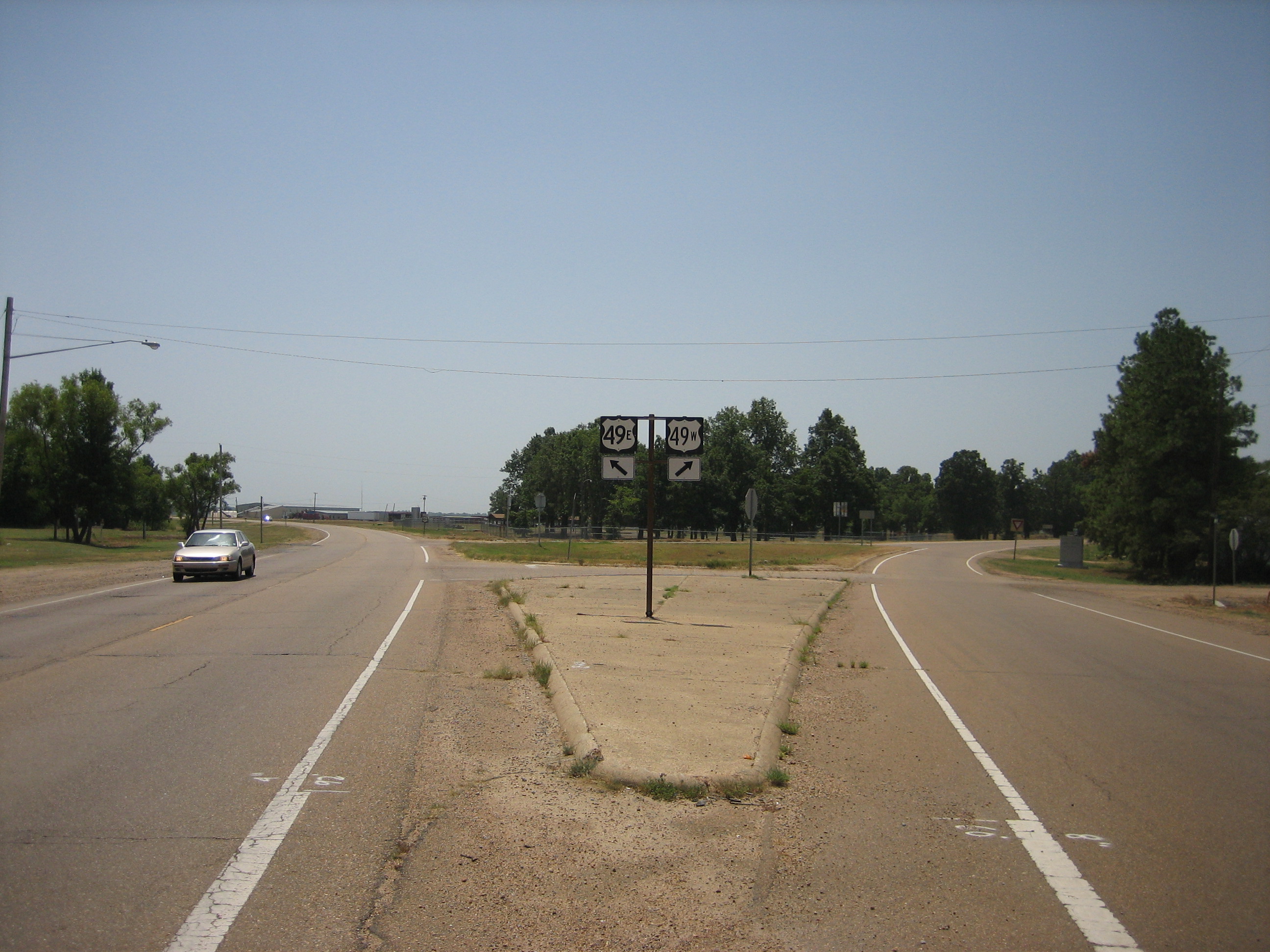 U.S. Route 49 splits into east and west routes. The west route goes to the Mississippi State Penitentiary (Parchman Farm) and the Dockery Plantation, while the east goes to Greenwood