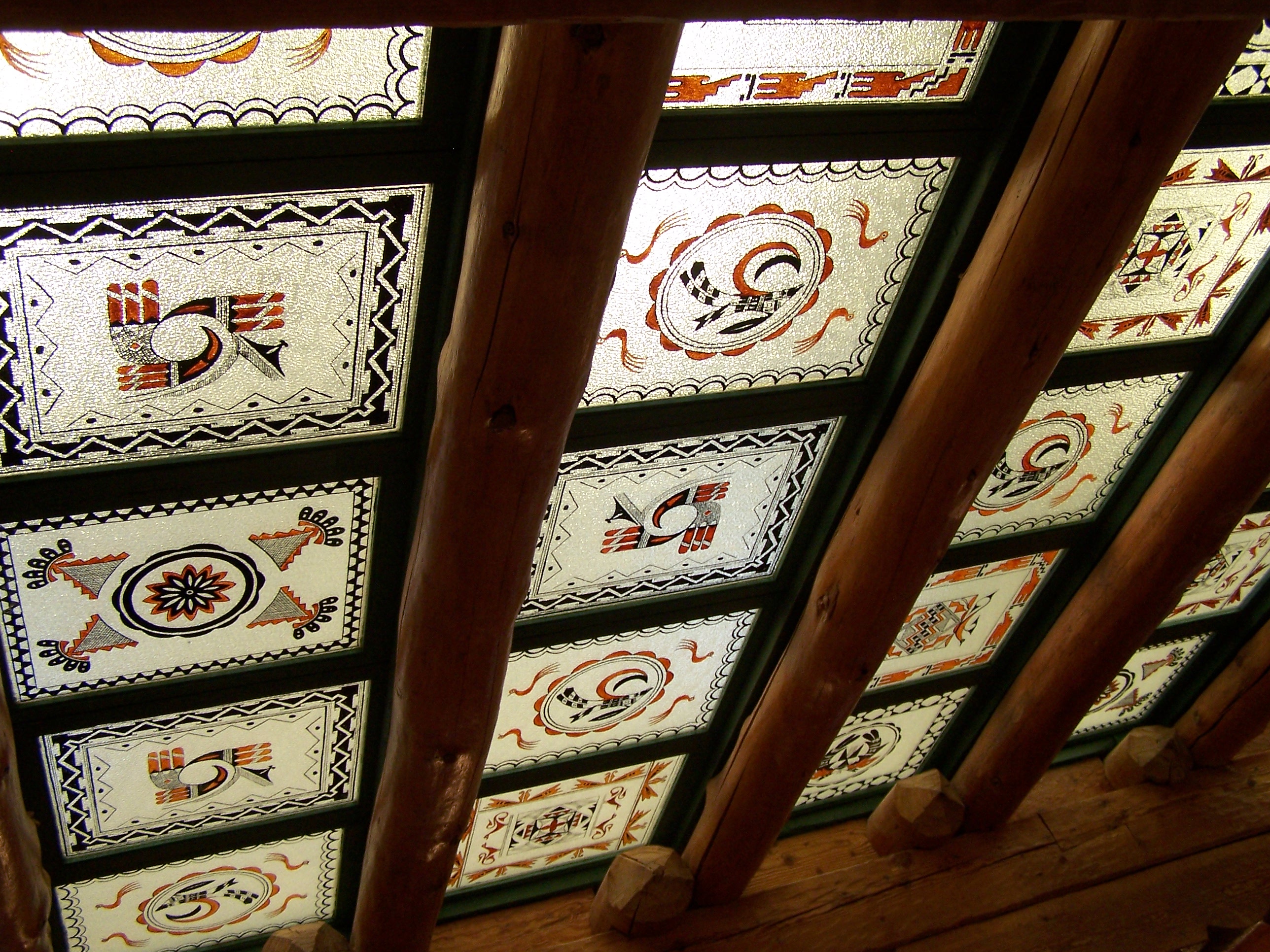 Hand-painted skylight panels done by the Civilian Conservation Corps have been recently refurbished and continue to grace the Painted Desert Inn Trading Post room. 
Image size: 2576 x 1932 

File size: 1.55 MB