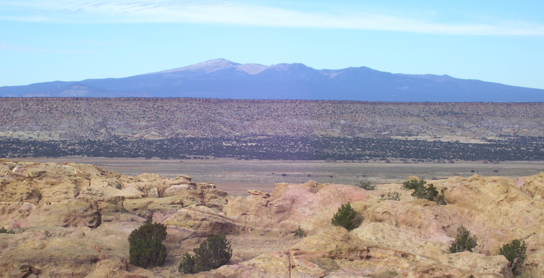 A view of Mount Taylor to the north from the west end of the Sky City of Acoma Pueblo.  The mountain is sacred to the Acoma people.