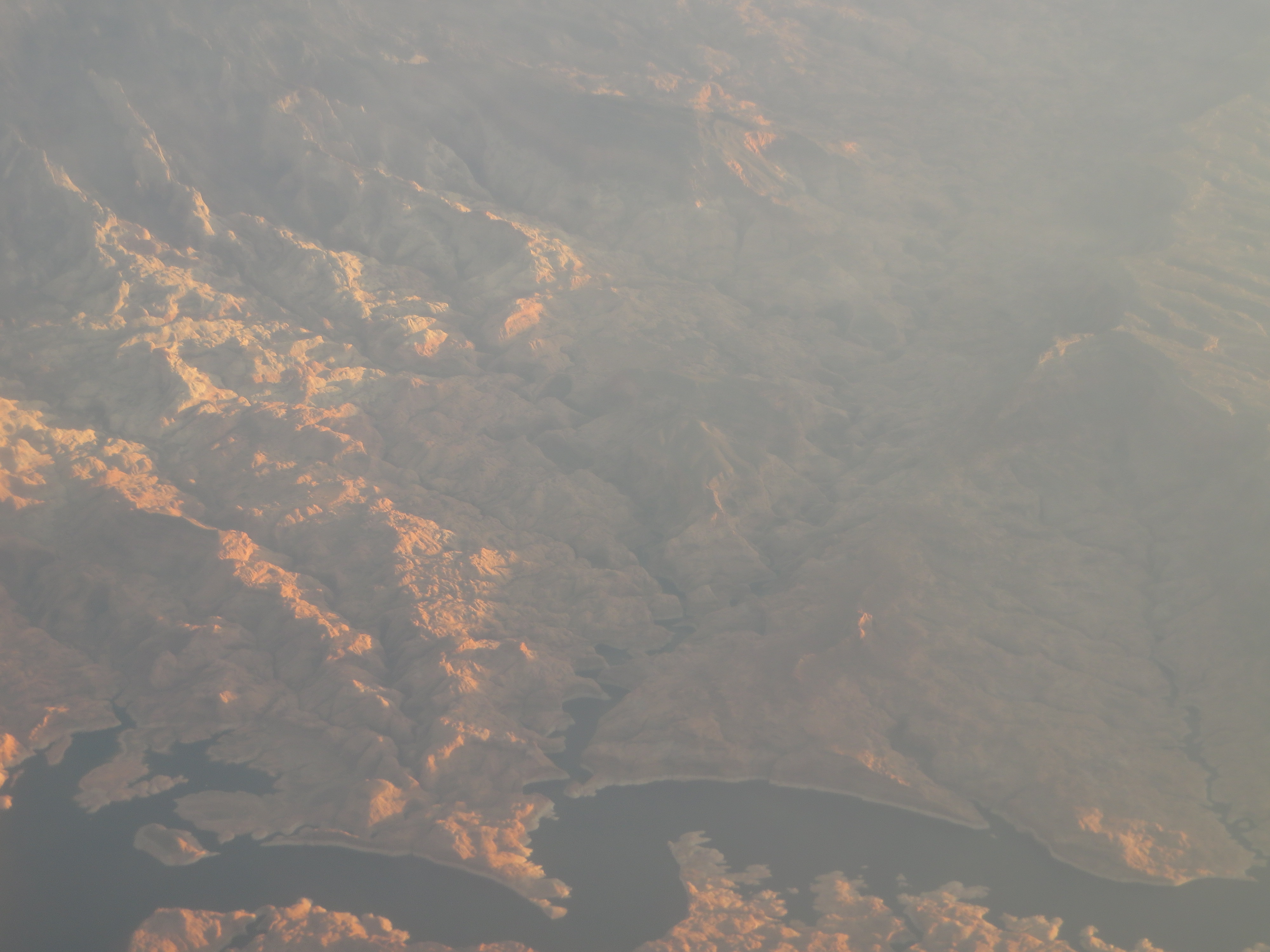 Rainbow Bridge National Monument is administered by Glen Canyon National Recreation Area, southern Utah, USA. Rainbow Bridge is often described as the world's highest natural bridge. The span of Rainbow Bridge was reported in 1974 by the Bureau of Reclamation to be 275 feet (84 m), but a laser measurement in 2007 has resulted in a span of 234 feet (71 m). At the top it is 42 feet (13 m) thick and 33 feet (10 m) wide.
Rainbow Bridge is one of the most accessible of the large arches of the world, as it can be reached by a two-hour boat ride on Lake Powell from either of two marinas near Page, Arizona, followed by a short mile-long walk from the National Park wharf in Bridge Canyon or by hiking several days overland from a trailhead on the south side of Lake Powell (obtain a permit from the Navajo Nation in Window Rock, Arizona).
en.wikipedia.org/wiki/Rainbow_Bridge_National_Monument

en.wikipedia.org/wiki/Wikipedia:Text_of_Creative_Commons_...