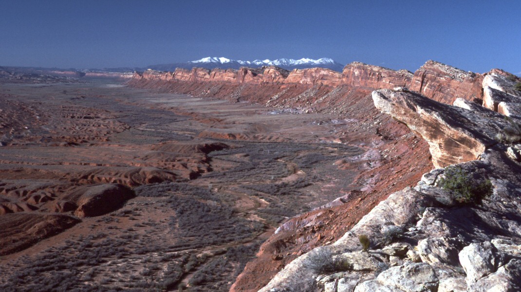 Comb Wash, Utah, looking north from near Hwy 163.  The Abajo Mtns. are seen in the distance.