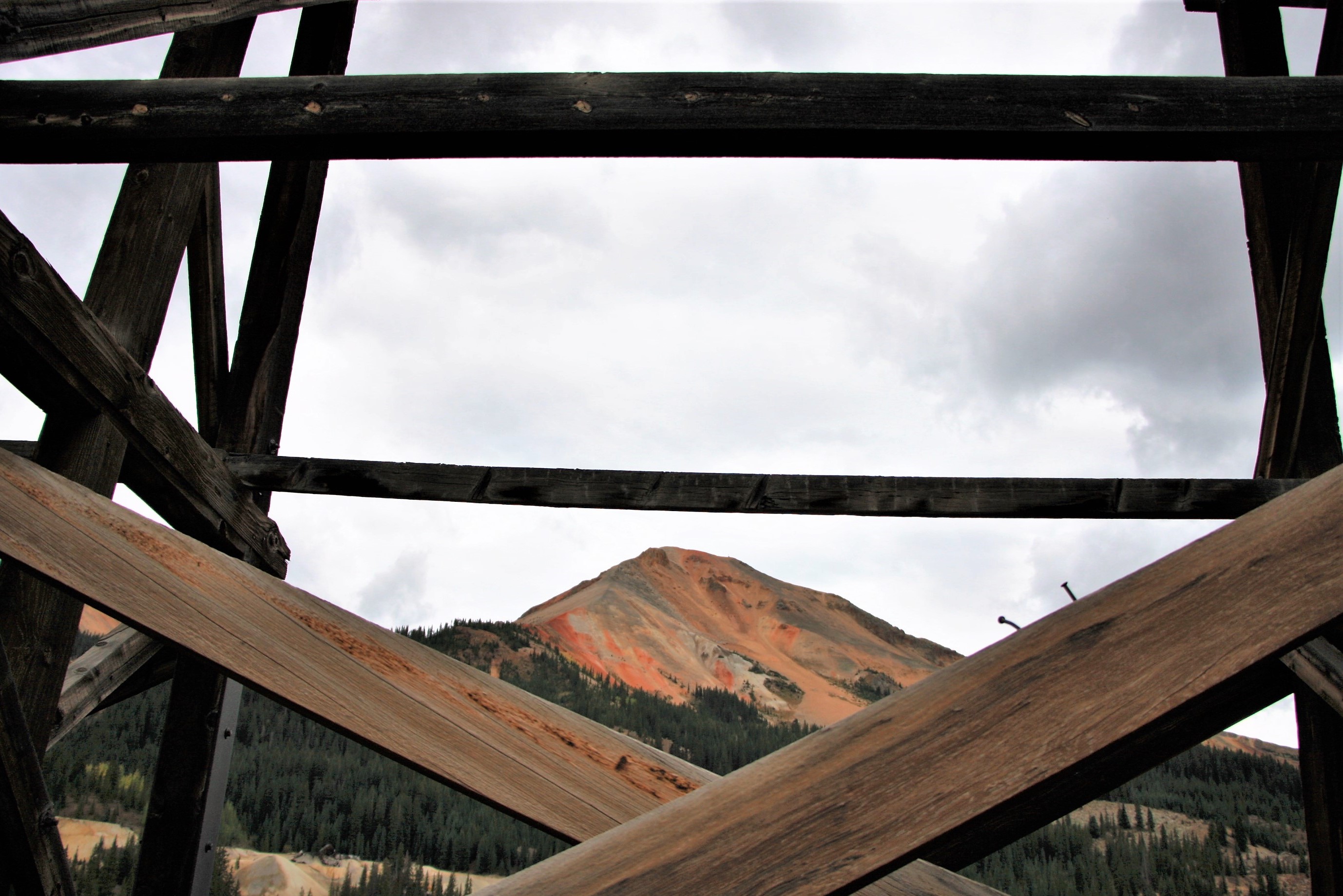 The Idarado Mine Trestle is a structure within a former mining operation in the Red Mountain Mining Distract of the San Juan Mountains of Colorado, located between Telluride and Ouray, that extracted lead, copper, zinc, gold and silver.  The mine officially opened in 1939 and officially ceased in 1978.  The Idarado Mine's extensive workings extended beneath the ridge with the west portal near Telluride and the eastern portal south of Ouray, Colorado.  While the Idarado Mine is not on the National Register of Historic Places, its historical significance is through the Lewis Mill listing.