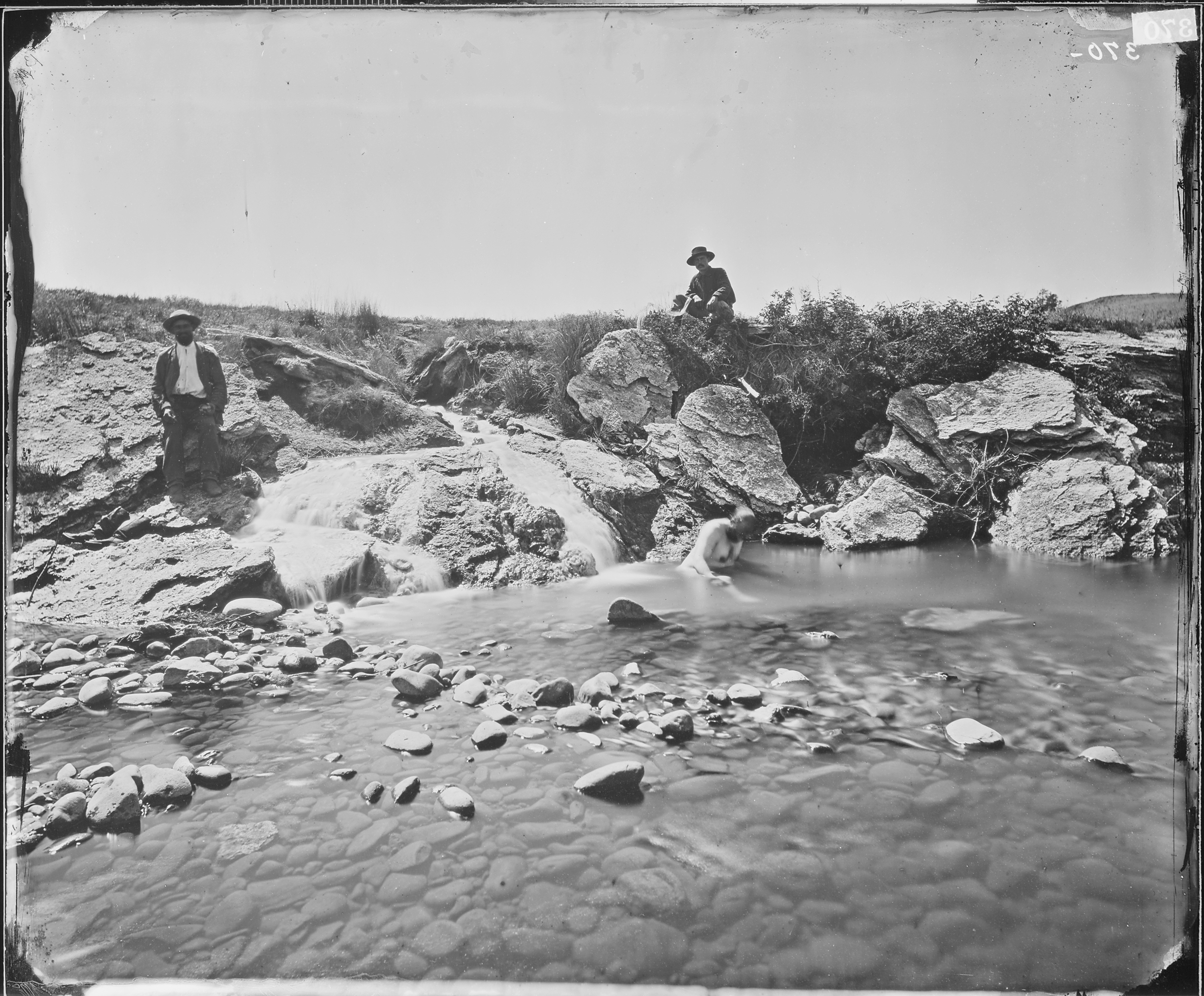 MAN BATHING IN PAGOSA HOT SPRING, COLORADO - NARA - 524321.jpg