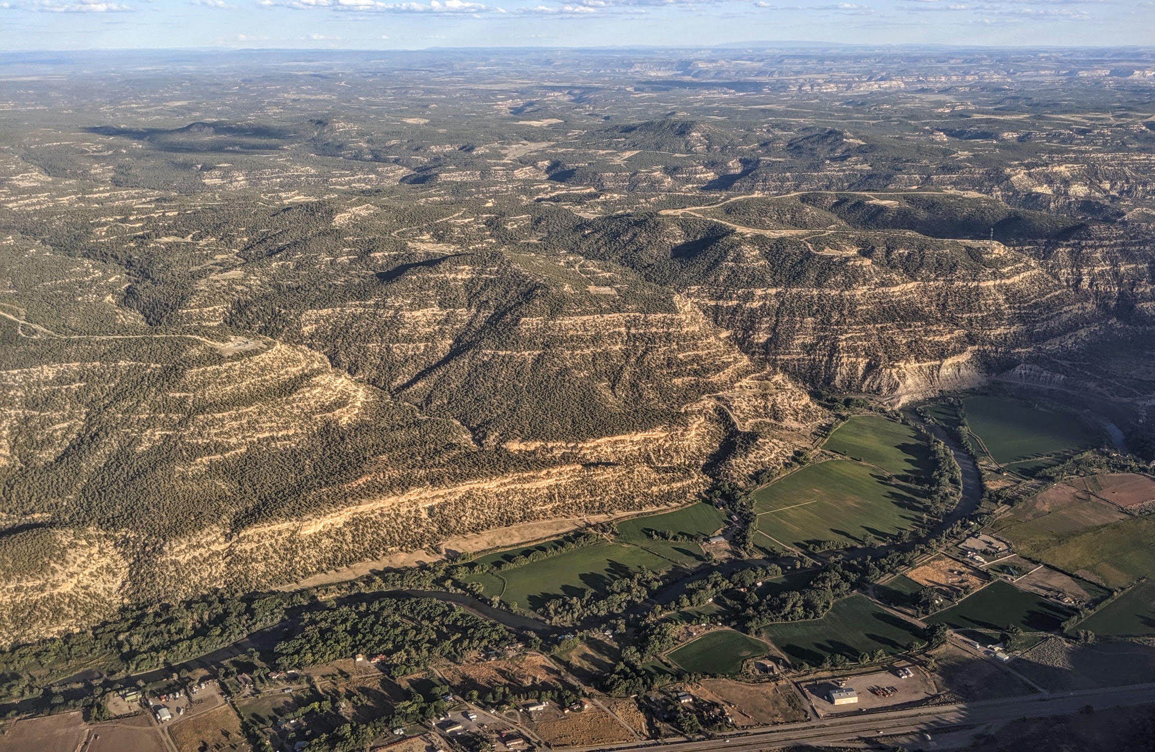 The Animas River between Cedar Hill, New Mexico, and the Colorado border; aerial view from the west on approach to Durango–La Plata County Airport
