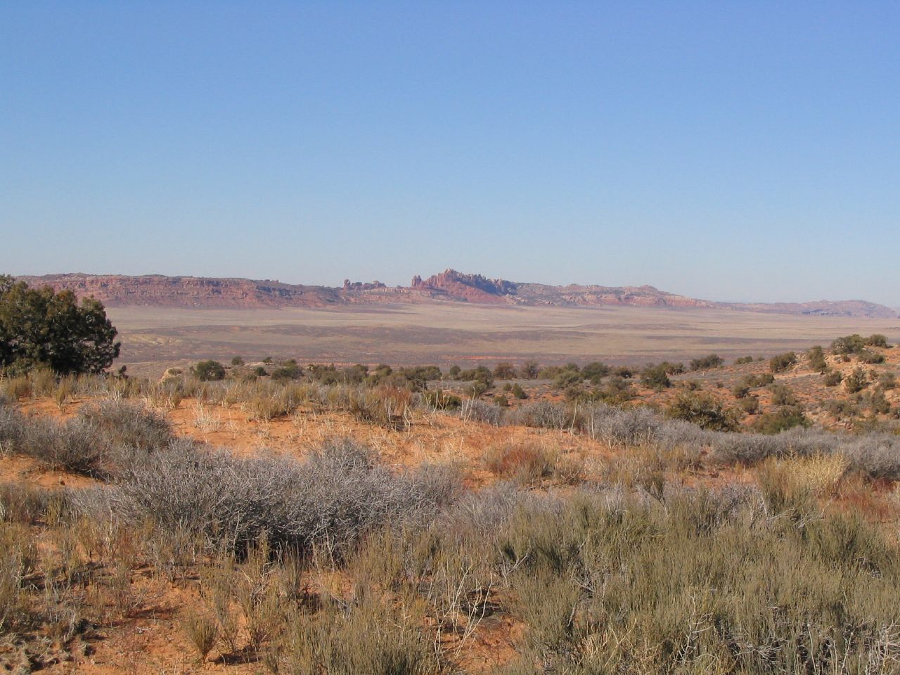 Arches National Park is a U.S. National Park in eastern Utah. It is known for preserving over 2000 natural sandstone arches, including the world-famous Delicate Arch, in addition to a variety of unique geological resources and formations.
The park is located just outside of Moab, Utah, and is 76,679 acres (31,031 ha) in area. Its highest elevation is 5,653 feet (1,723 m) at Elephant Butte, and its lowest elevation is 4,085 feet (1,245 m) at the visitor center. Forty-three arches have collapsed due to erosion since 1970. The park receives 10 inches (250 mm) of rain a year on average.
Administered by the National Park Service, the area was originally created as a National Monument on April 12, 1929. It was redesignated as a National Park on November 12, 1971.
en.wikipedia.org/wiki/Arches_National_Park

en.wikipedia.org/wiki/Wikipedia:Text_of_Creative_Commons_...