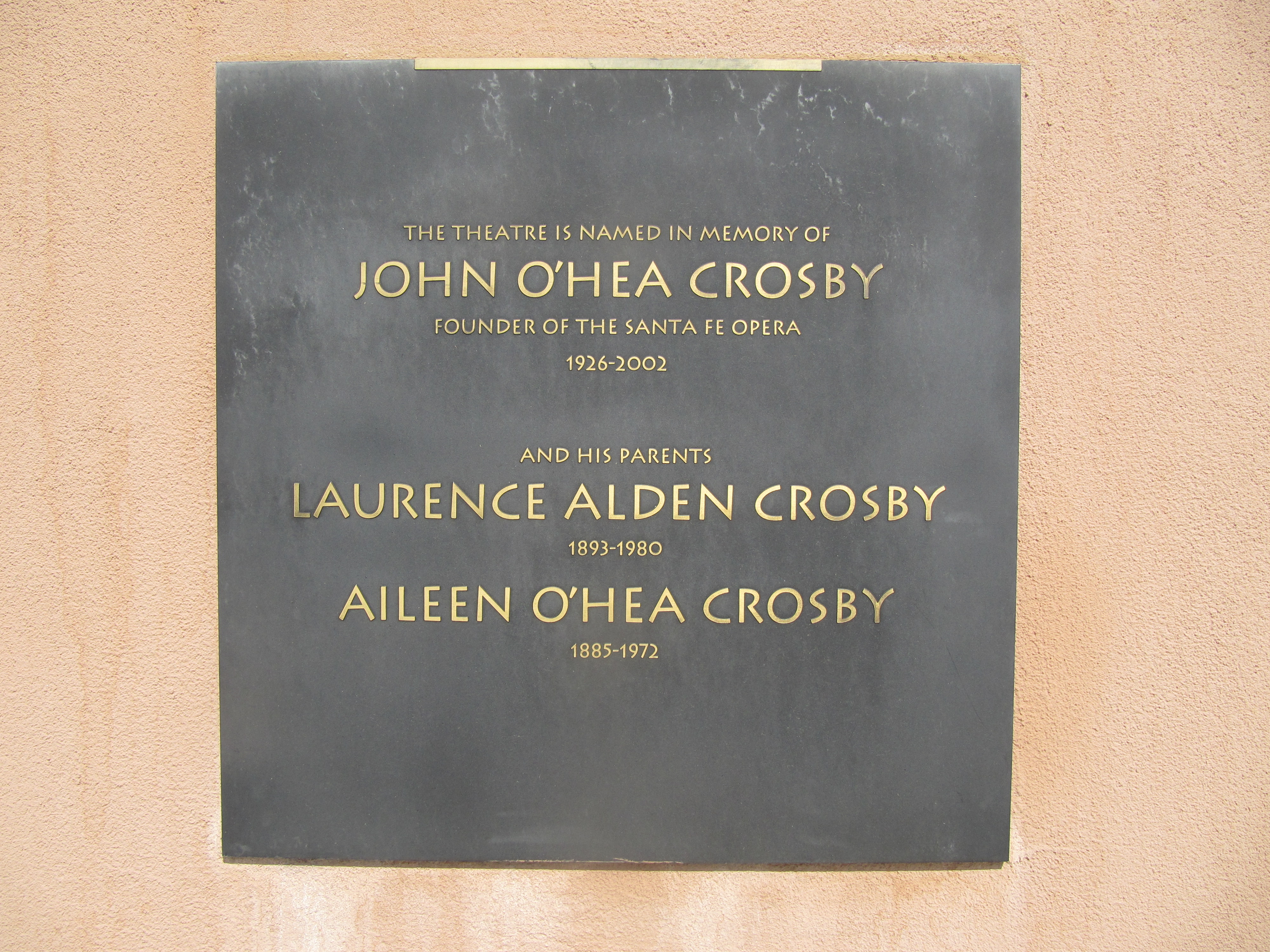 Plaque on the terrace at the Santa Fe Opera, commemorating the contributions of founding director John Crosby and his parents, Lawrence and Aileen