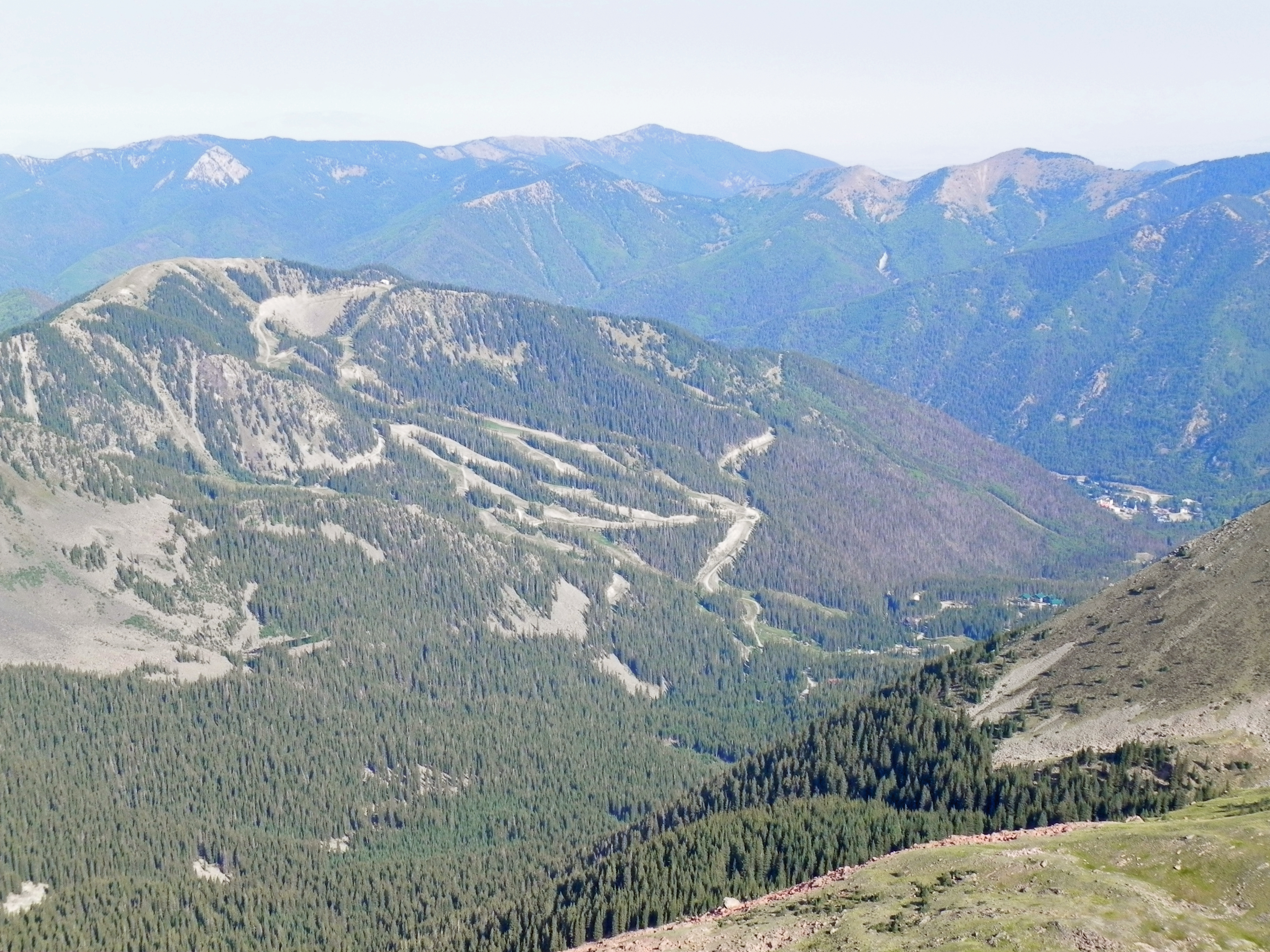 Taos Ski Valley, New Mexico viewed from Wheeler Peak in the Sangre de Cristo Mountains of Carson National Forest.