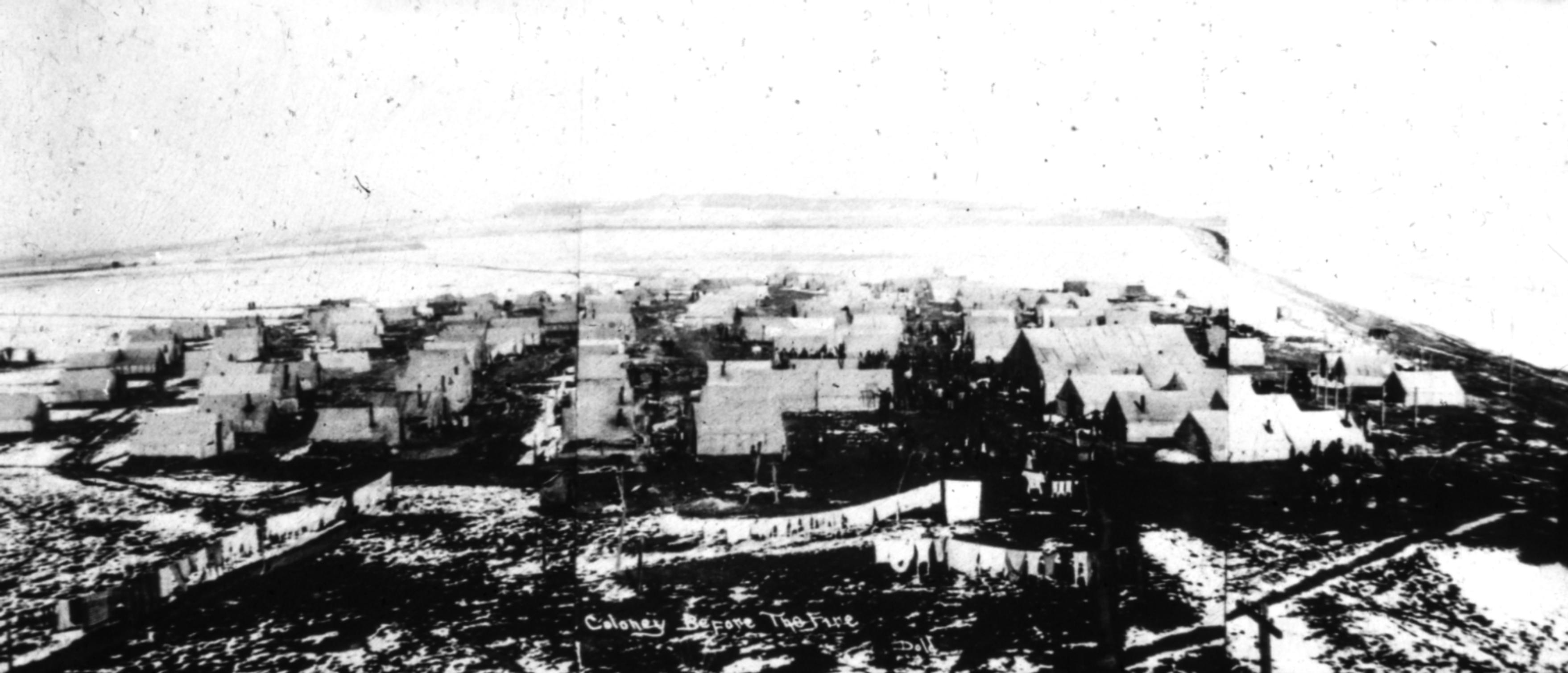 Panoramic view of the Ludlow tent colony in Ludlow, Colorado before the fire. There is laundry on clothing lines.