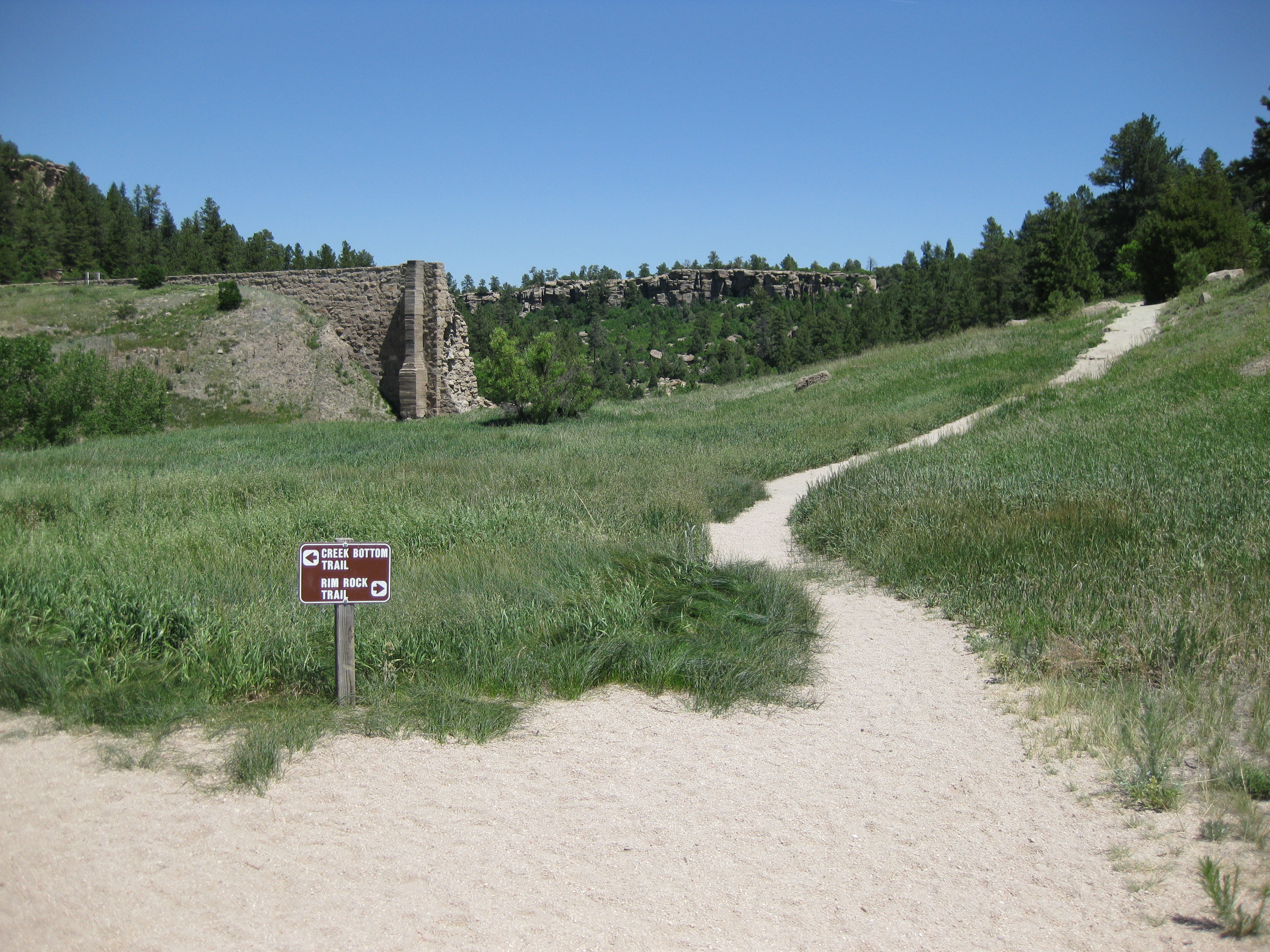 Looking north from the former "lake bottom" to the remains of Castlewood Dam in Castlewood Canyon State Park, Colorado, U.S.A.