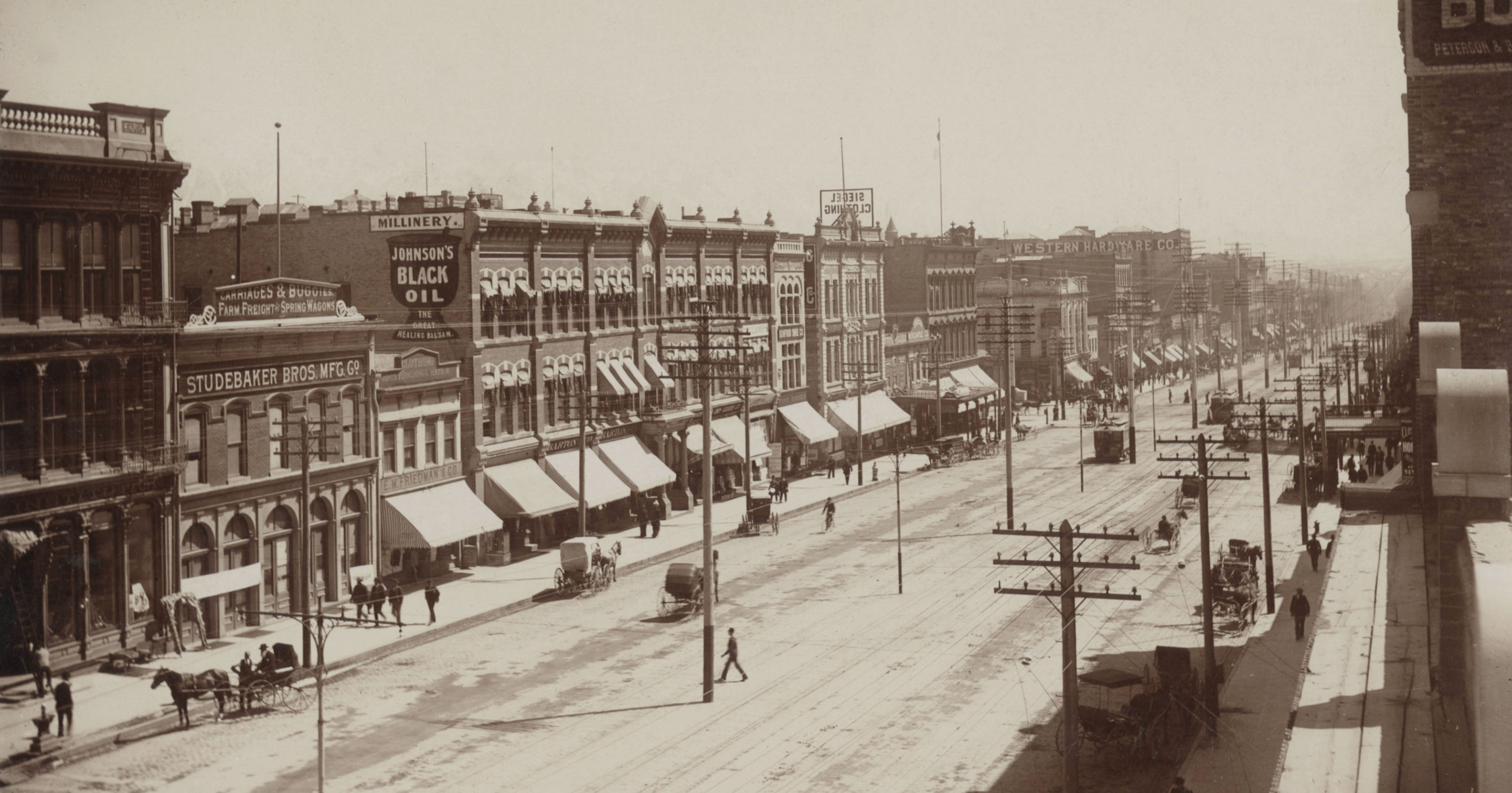 The east side of Main Street (also known as East Temple Street) in Salt Lake City, Utah. The photo was taken in the 1890s by photographer Charles Roscoe Savage.