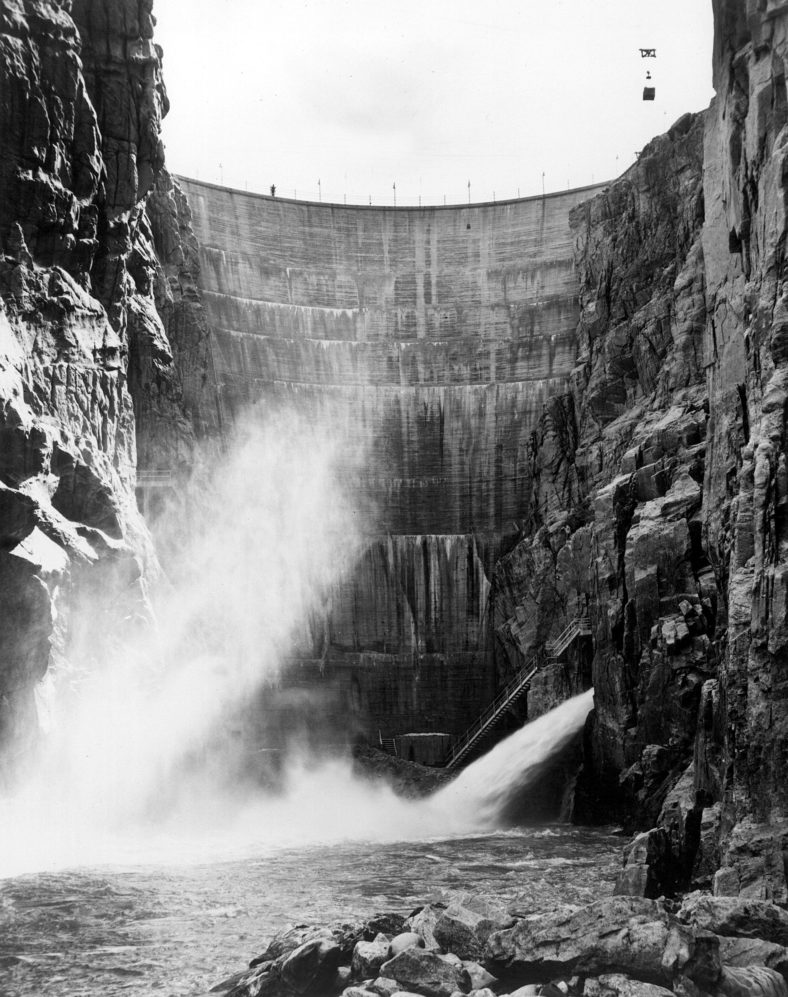 One of the first high concrete dams built by the Bureau of Reclamation is Buffalo Bill Dam on the Shoshone River, about 7 miles west of Cody, Wyoming.