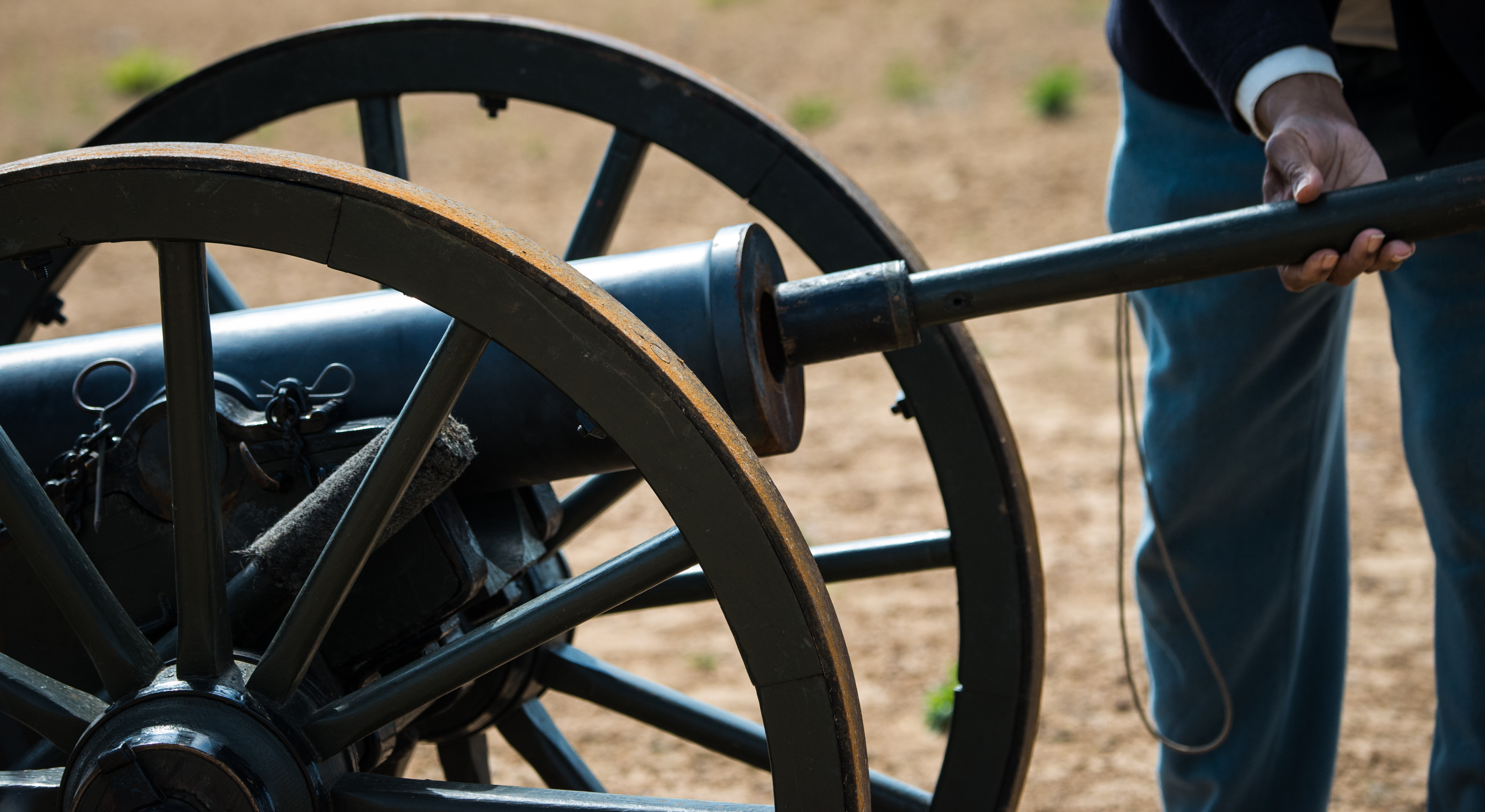 A Civil War era cannon is loaded and fired by Oklahoma Historical Society’s, Ft. Gibson Historic Society staff member Omar Reed and site director Christopher Price who provide living history tours, on the site of the Civil War’s Battle of Honey Springs, in Rentiesville, OK, on Wednesday, April 6, 2015. Mr. Reed’s living history role represents an era from 1820 to post Civil War. The current one-room visitor center is set to relocate into the future Honey Springs Visitors’ Center that will be a multi-purpose community center/public library/and battlefield interpretive center. The federal involvement includes the National Park Service, as well as all three agencies of the U.S. Department of Agriculture (USDA) Rural Development (RD), Rural Business Service (RBS), Rural Utilities Service (RUS), and Rural Housing Service (RHS). USDA photo by Lance Cheung.