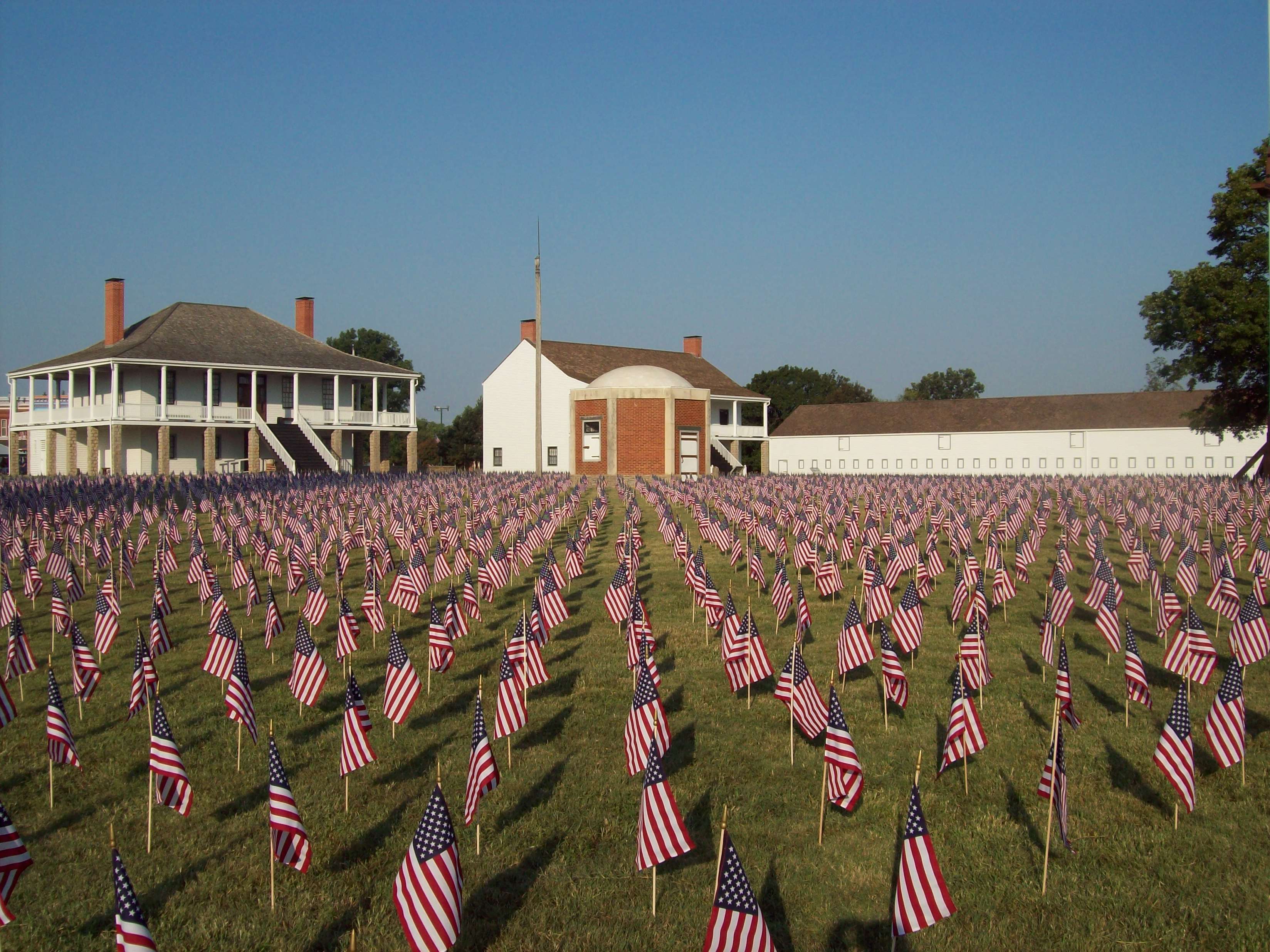 Field of US Flags with buildings in back ground
Keywords: flags; sacrifice; Fort Scott NHS