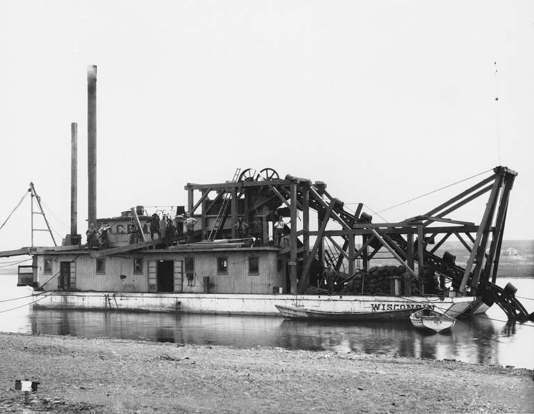 Caption on image: "Dredging on Snake River, Nome"  Original image in Hegg Album 30, page 36 .  Original photograph by Eric A. Hegg 1358; copied by Webster and Stevens 190.A .  Nome Gold Rush.
Subjects (LCTGM): Dredges--Alaska--Nome; Rivers--Alaska--Nome; Gold dredging--Alaska--Nome
Subjects (LCSH): Wisconsin (Ship); Snake River (Nome, Alaska)