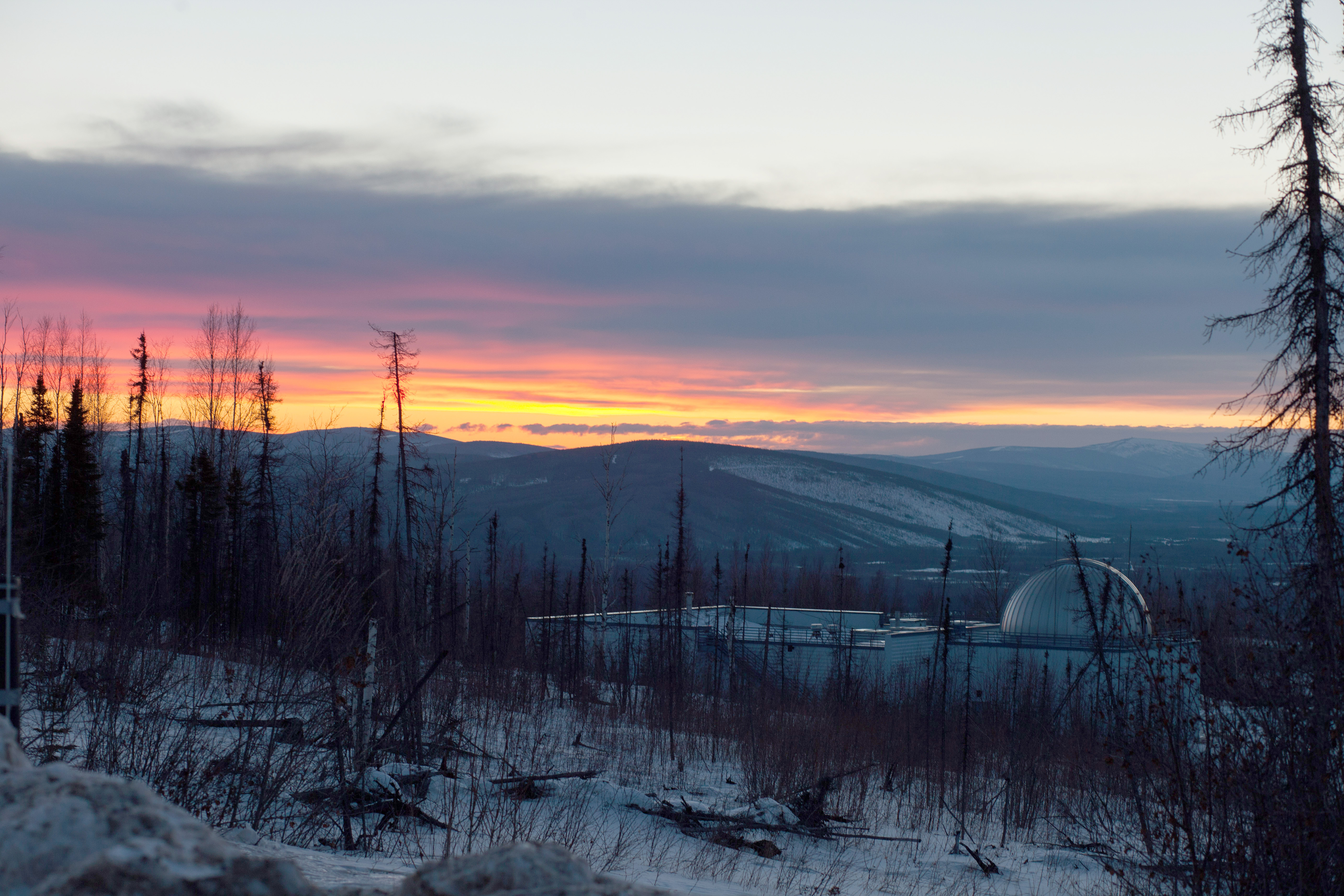 The sun sets over Poker Flat Research Range in Alaska.