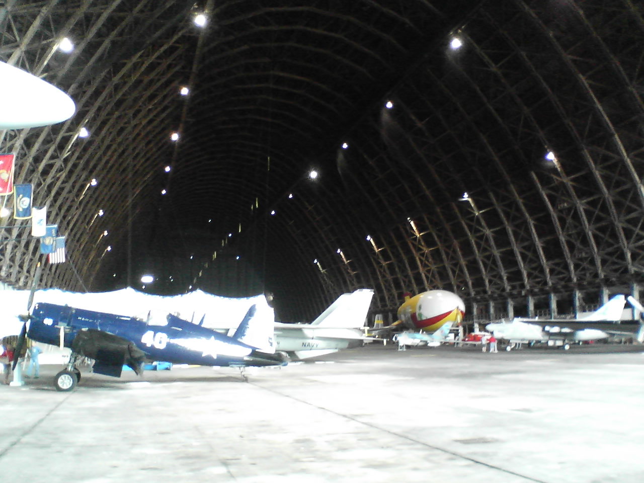 Interior photo of the exhibit area at the en:Tillamook Air Museum in en:Tillamook, Oregon, en:United States. The building is the dirigible hangar of the former en:Tillamook Naval Air Station, and is listed on the en:National Register of Historic Places.
