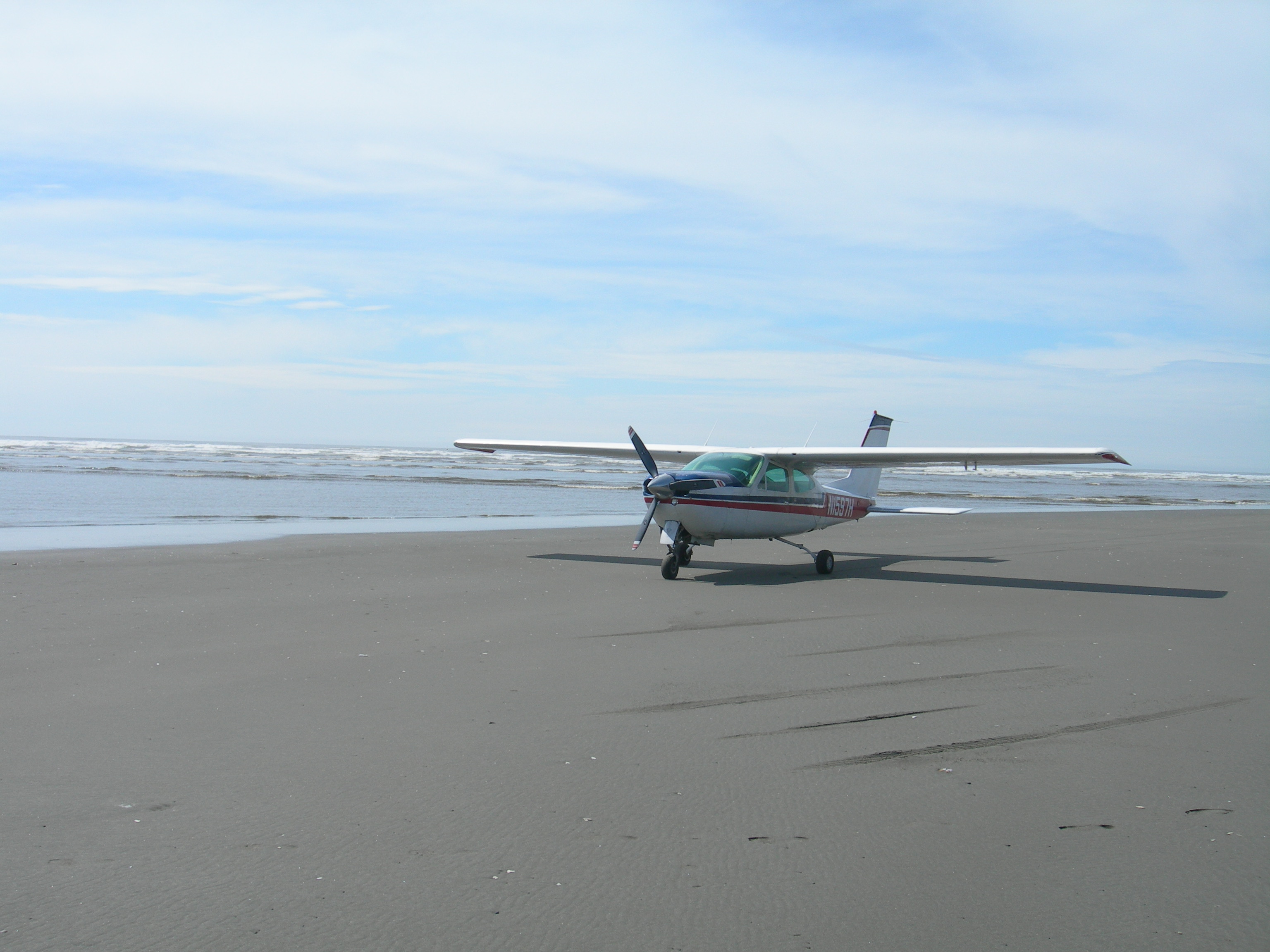 An aircraft parked on the beach at Copalis State Airport.