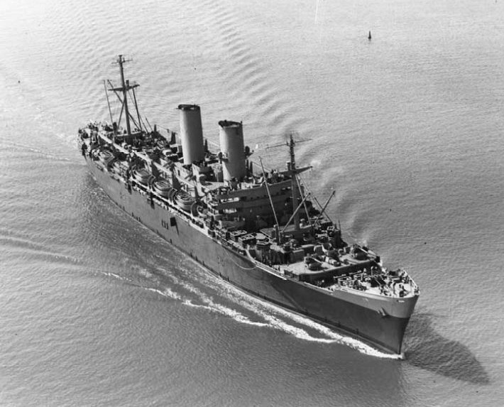 The U.S. Navy troop transport USS General M. C. Meigs (AP-116) underway in Hampton Roads, Virginia (USA), on 4 July 1944, soon after completion. The photo was taken from an aircraft assigned to Naval Air Station Hampton Roads.
