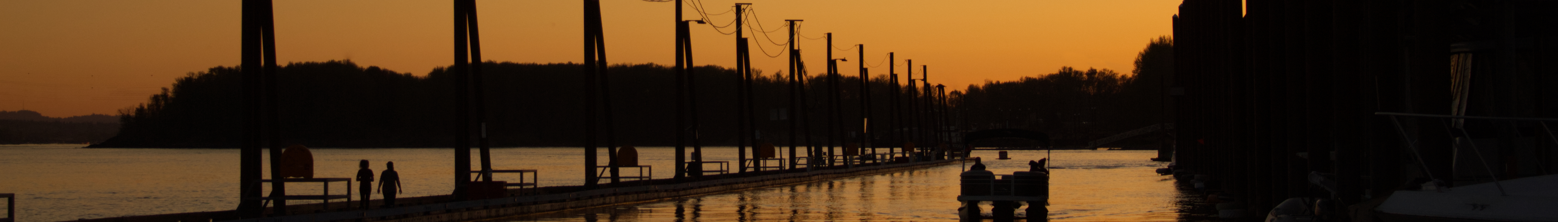 We left our home state of Oregon, just long enough to cross over into Washington on the other side of the Columbia River. We wanted to shoot Mt. Hood from across the river. While awaiting sunset I did manage to shoot this lone pontoon boat making its way back into Washougal harbor after a day of fun and sun on the river.
