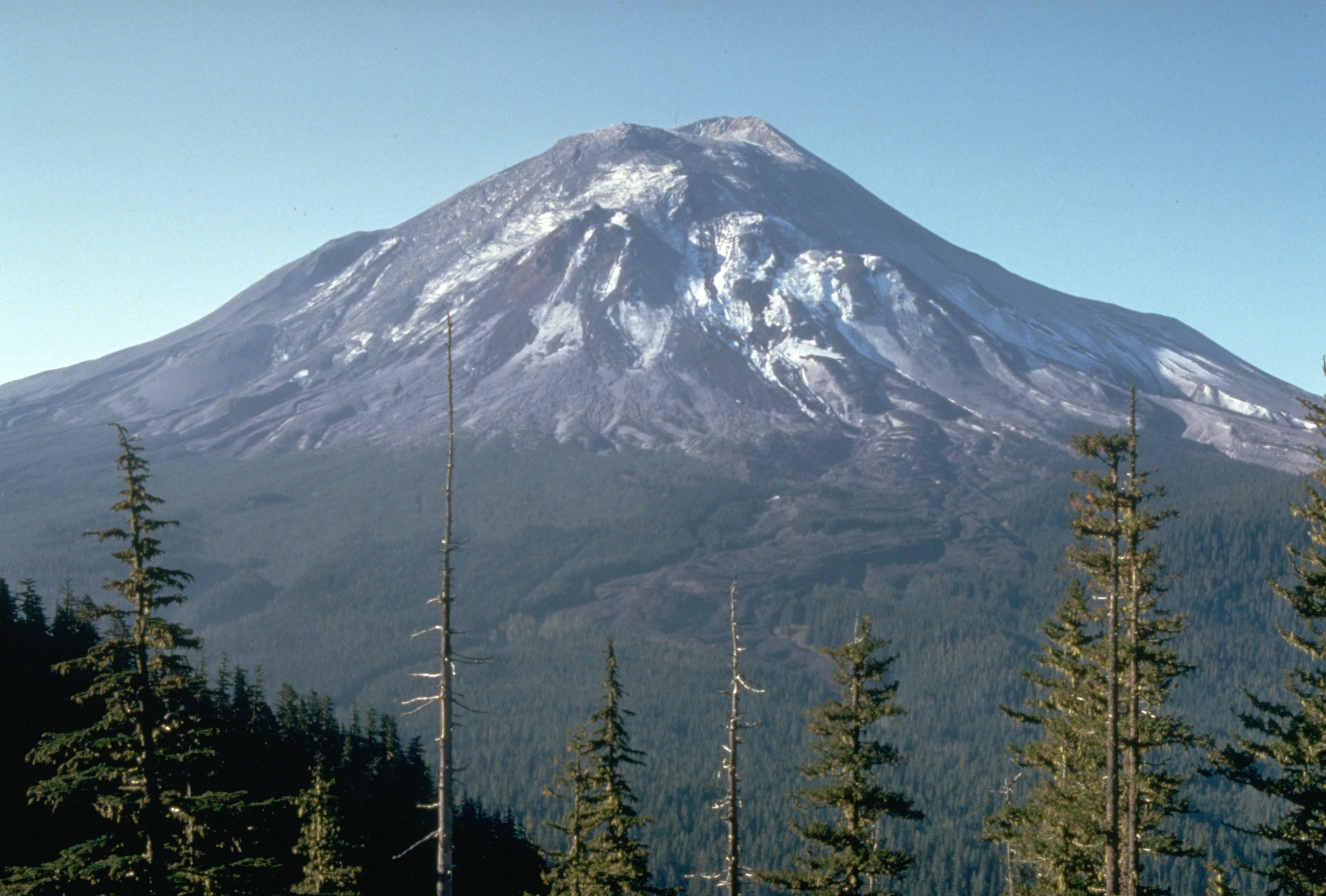 This slide shows Mount St. Helens, one day before the devastating eruption. The view is from Johnston Ridge, six miles (10 kilometers) northwest of the volcano.