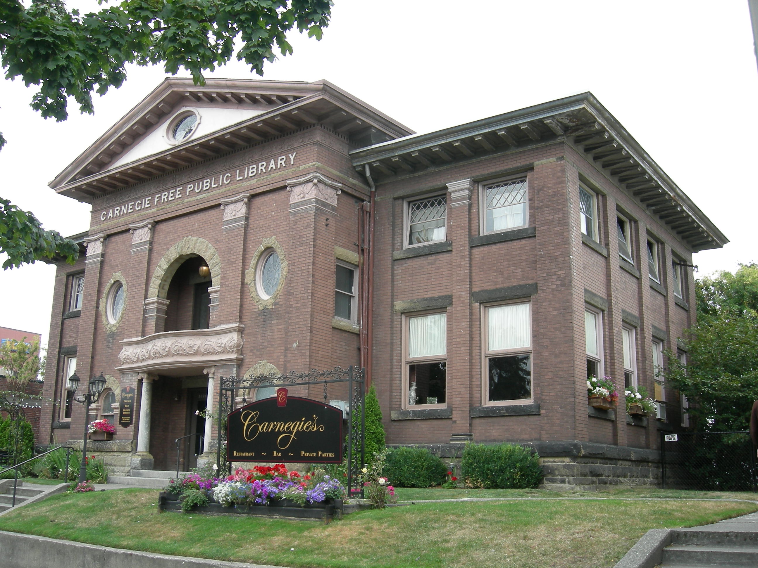 Old Carnegie Library, Ballard, Seattle, Washington, now shops and a restaurant. The building is on the National Register of Historic Places