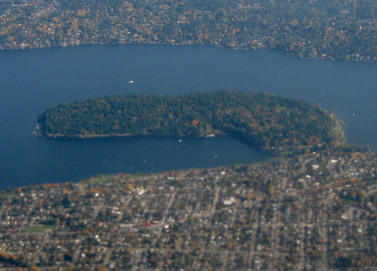 Aerial view of Seward Park, Seattle, viewed from west looking east. Seattle is at bottom and Mercer Island at top, with Lake Washington surrounding the park. Crop of File:Aerial view of Seward Park and Mercer Island.jpg. Taken by myself from a commercial airliner window.