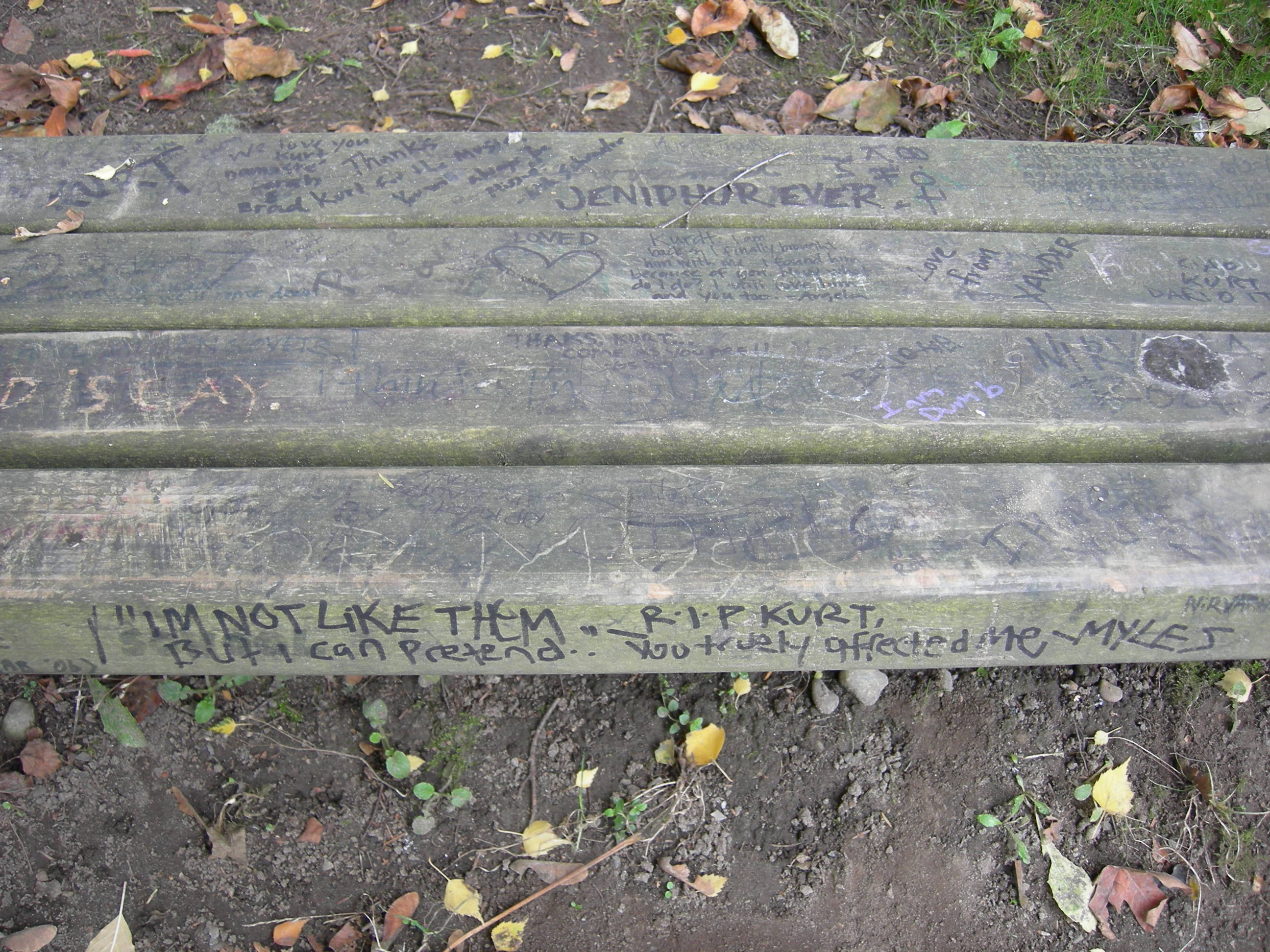 The bench in Viretta Park, Seattle, Washington, has been heavily graffitied as a de facto memorial to Kurt Cobain, who lived the last part of his life in a home directly adjacent to the park.