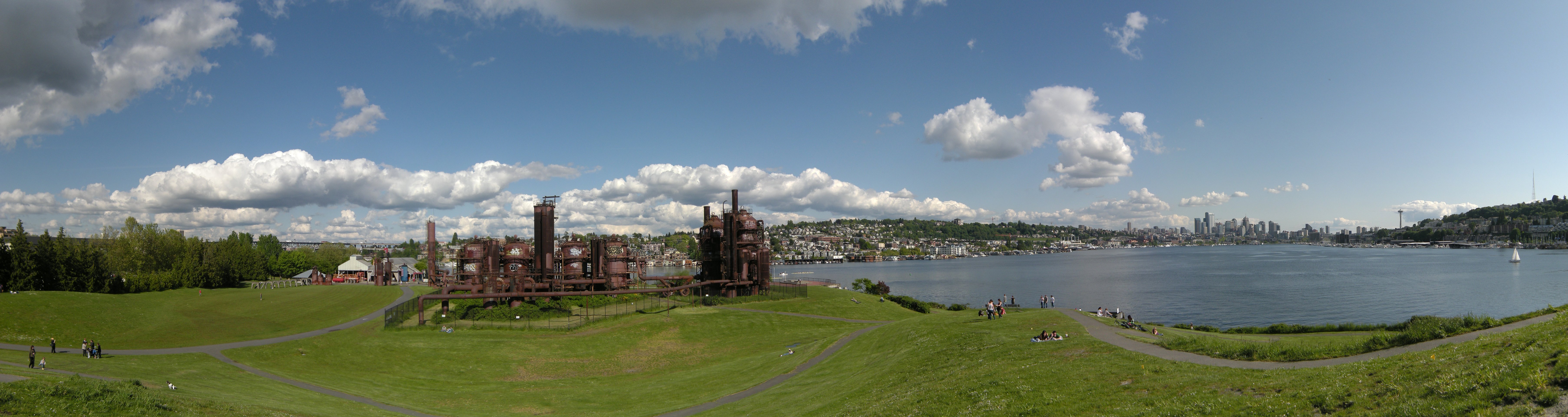 Panoramic view from Gas Works Park, Seattle, Washington, USA. Shows (from left to right) playfield, old rail piers (piers in the sense of holding up train tracks), play barn, portions of the old gas works including the "forbidden zone", Lake Union and behind the lake Capitol Hill, South Lake Union and Downtown Seattle, the Space Needle, and part of Queen Anne Hill.
Created with Hugin from 9 photos.

 This  image was created with Hugin.