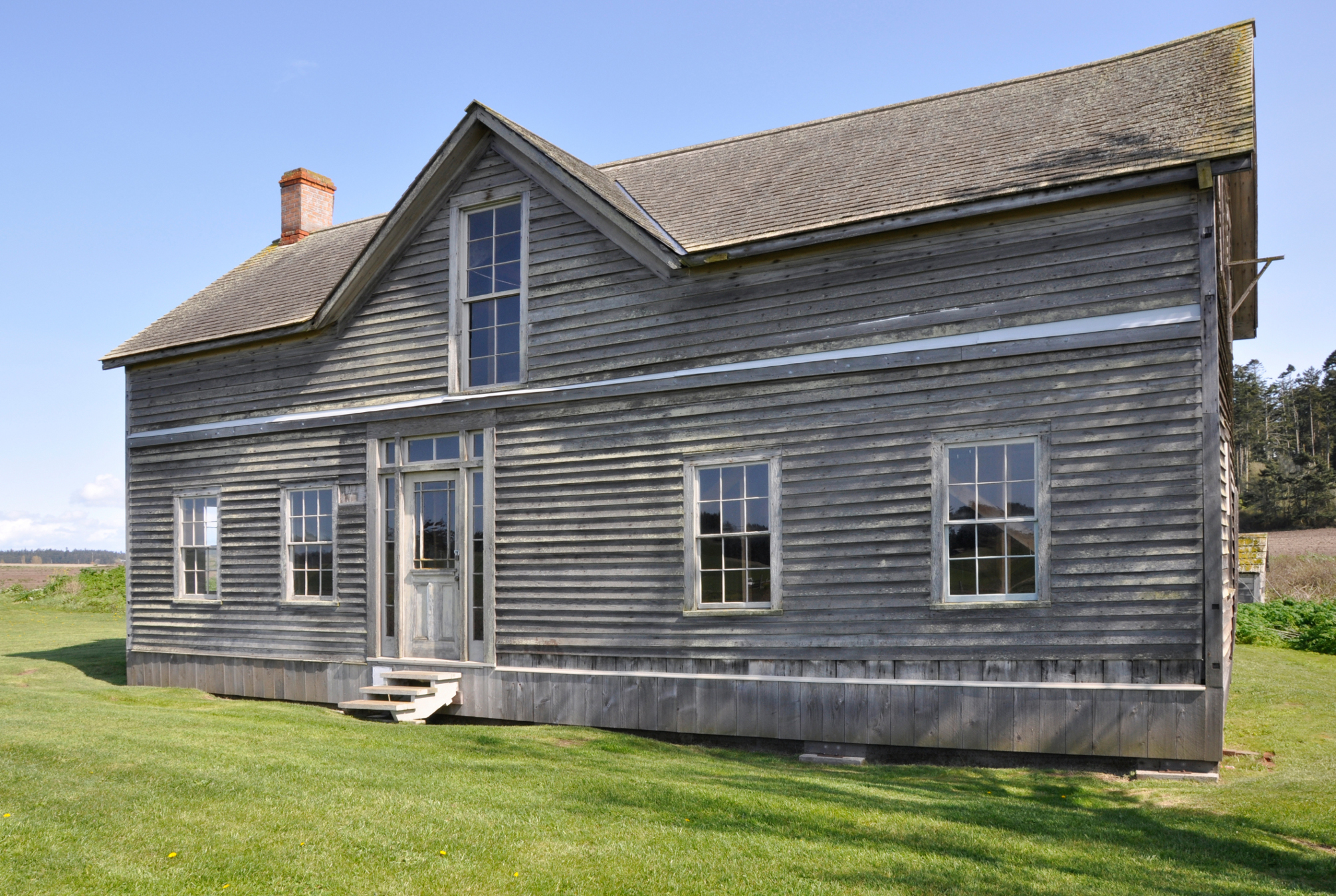 A view of the front facade of the Ferry House, Ebey's Landing, Whidbey Island, Washington, United States