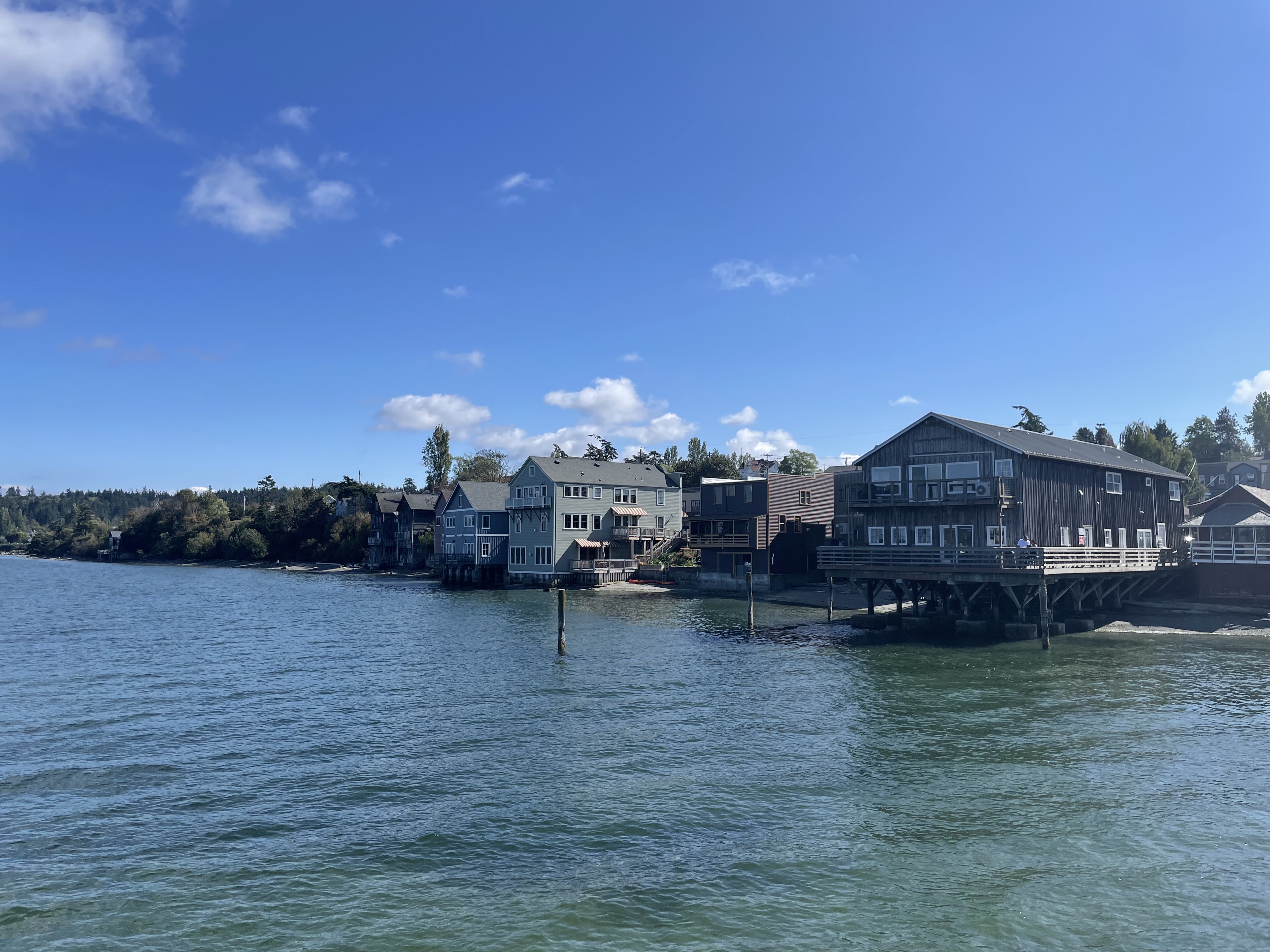 Shops and homes along the main waterfront in Coupeville WA in September 2024.