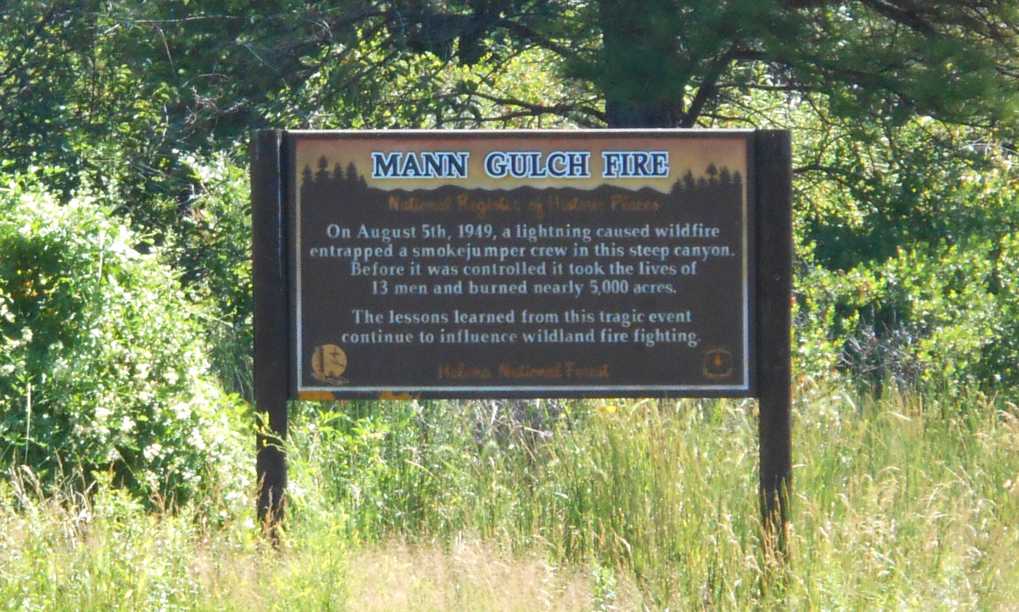 Sign for the Mann Gulch fire, a 1949 wildfire disaster in Mann Gulch on the Missouri River, now in the Gates of the Mountains Wilderness Area of the Helena National Forest. The site is listed on the National Register of Historic Places.