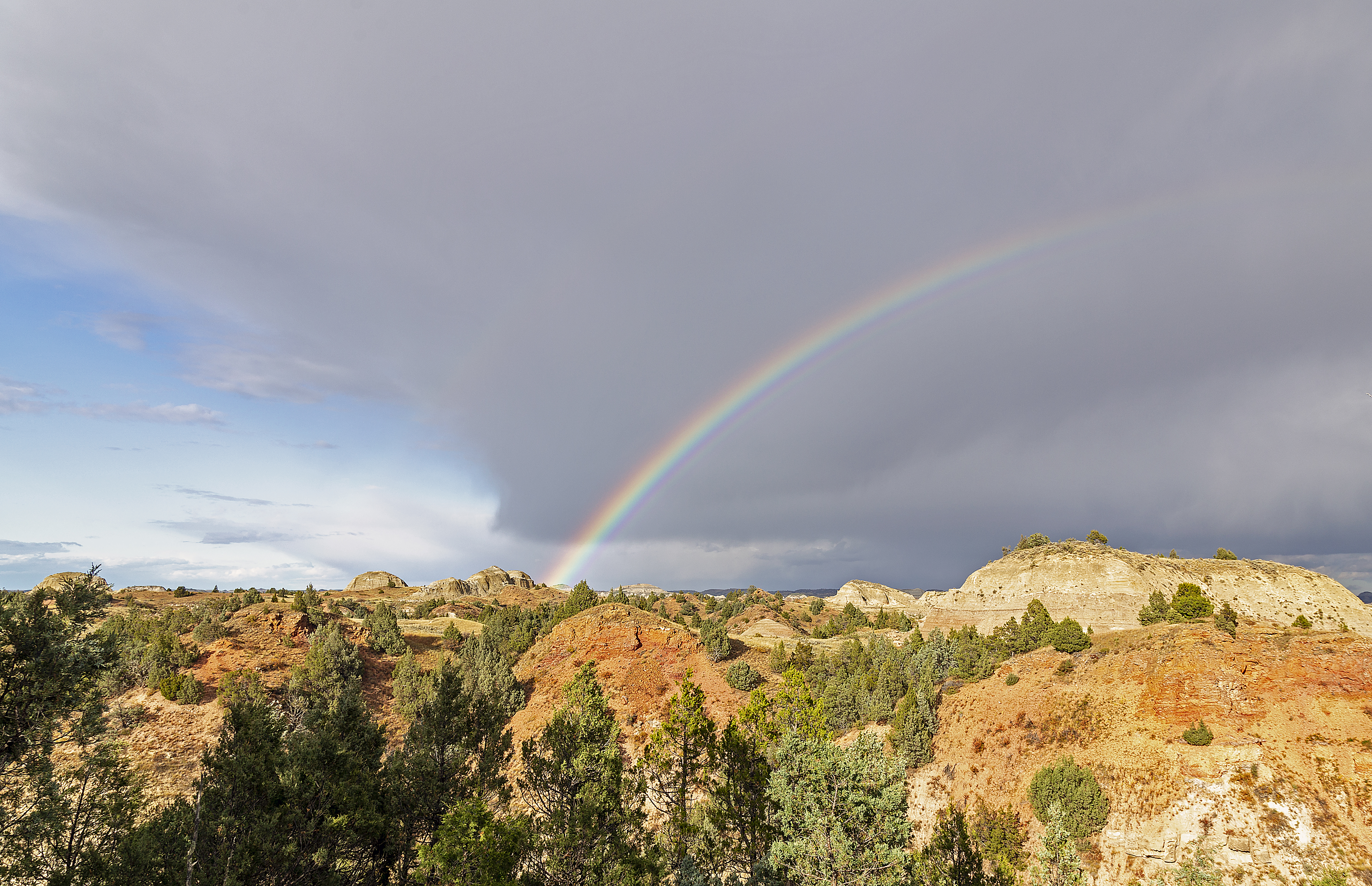 Rainbow in the badlands of the South Unit of Theodore Roosevelt National Park, near Medora, North Dakota, USA