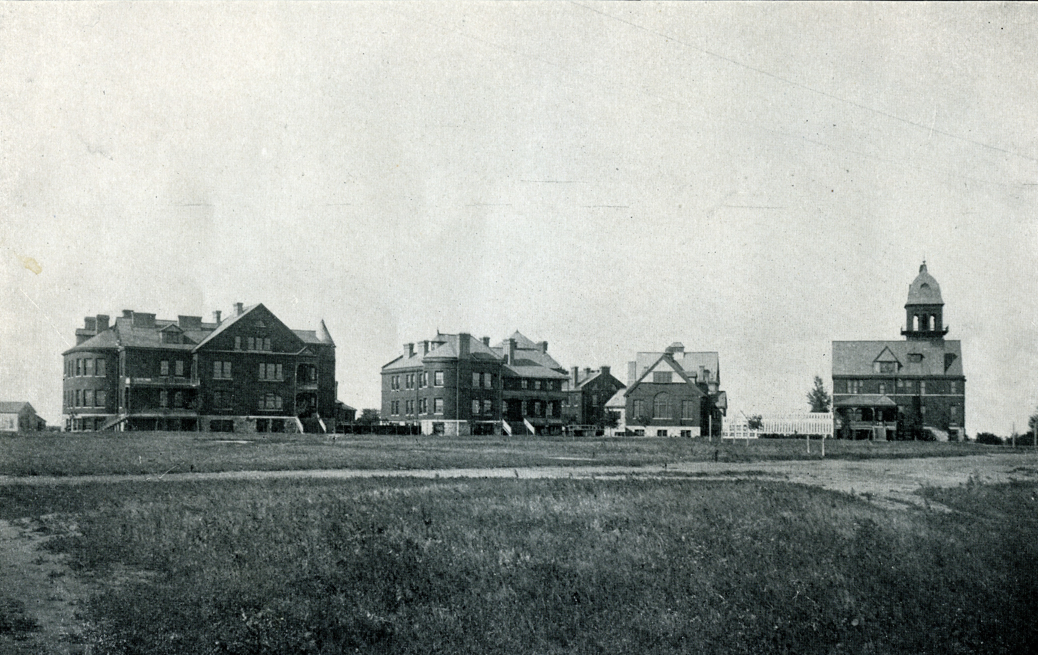 Several buildings on the State Insane Hospital campus in Jamestown, North Dakota, circa 1895-1901.