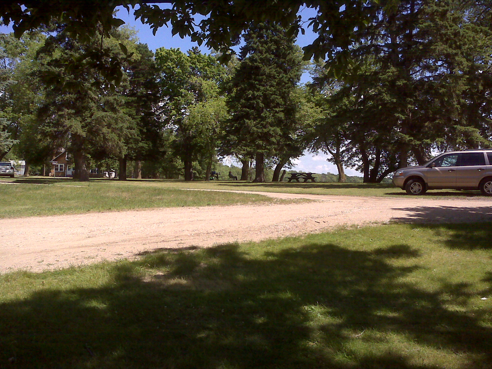 This is a scene of one of Glendalough State Park's picnic and beach areas. This one is on the shore of Annie Battle Lake and is the hub for several hiking trails. Glendalough State Park is close to the town of Battle Lake, Otter Tail County in western/northwestern Minnesota.