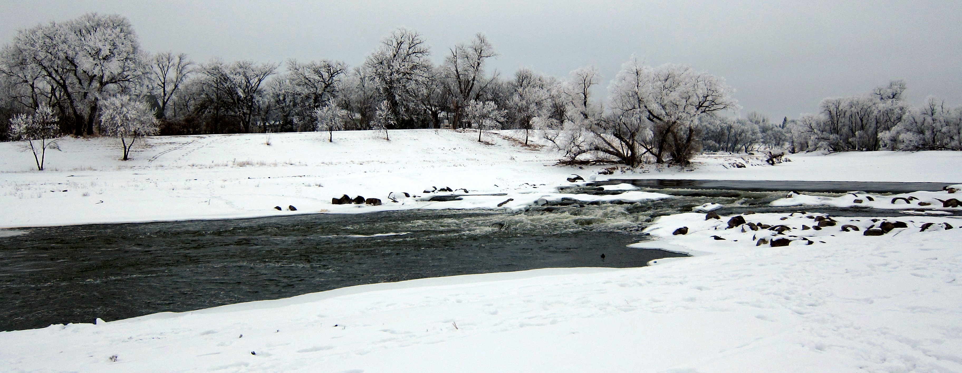 The Red River of the North, looking at the Moorhead, MN bank from the Fargo, ND bank, near the Main Ave. dam.