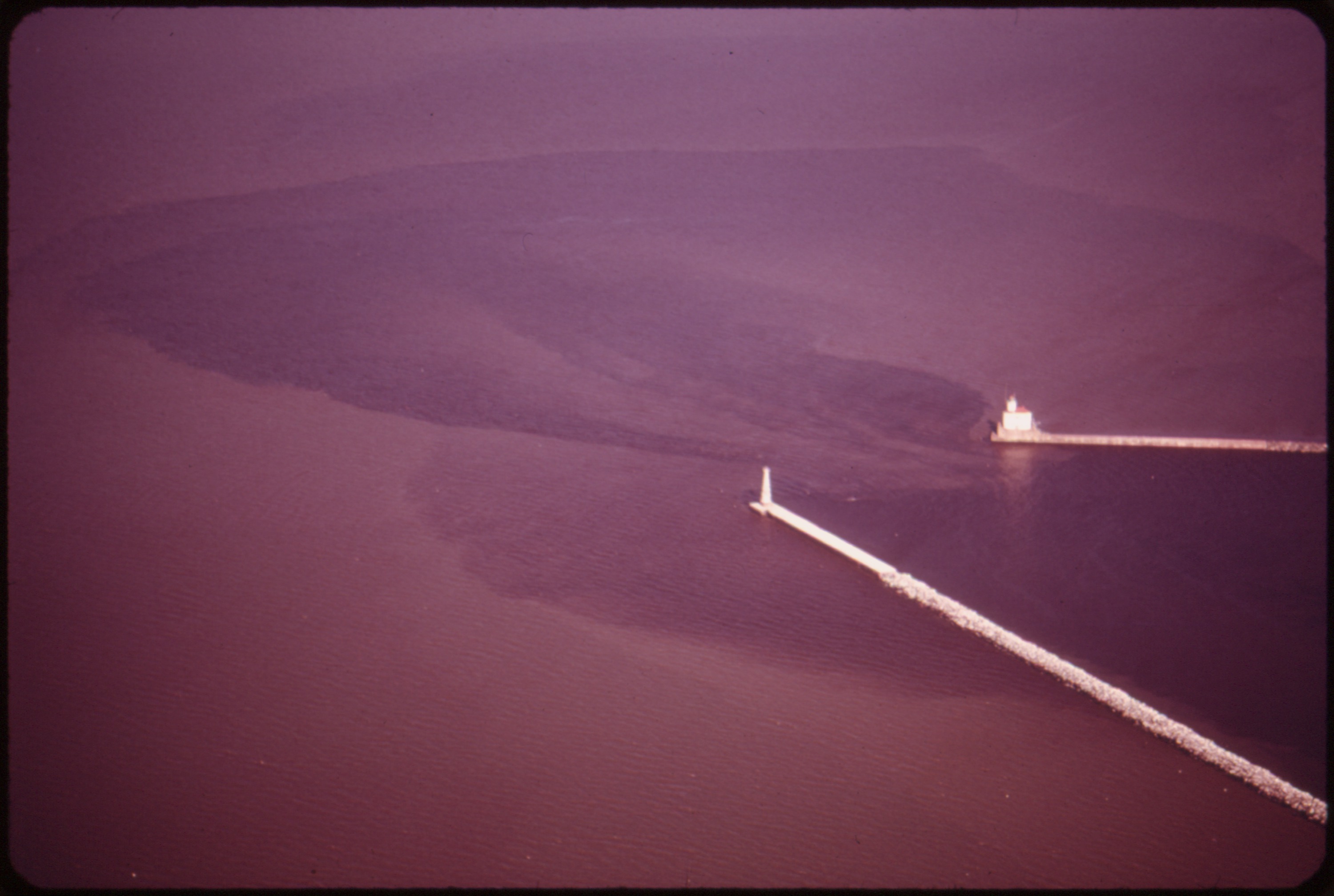 THE ST. LOUIS RIVER BASIN DISCHARGES ITS WATERS INTO LAKE SUPERIOR THROUGH THE DULUTH SHIP CANAL. THE RIVER WATERS... - NARA - 551600.jpg