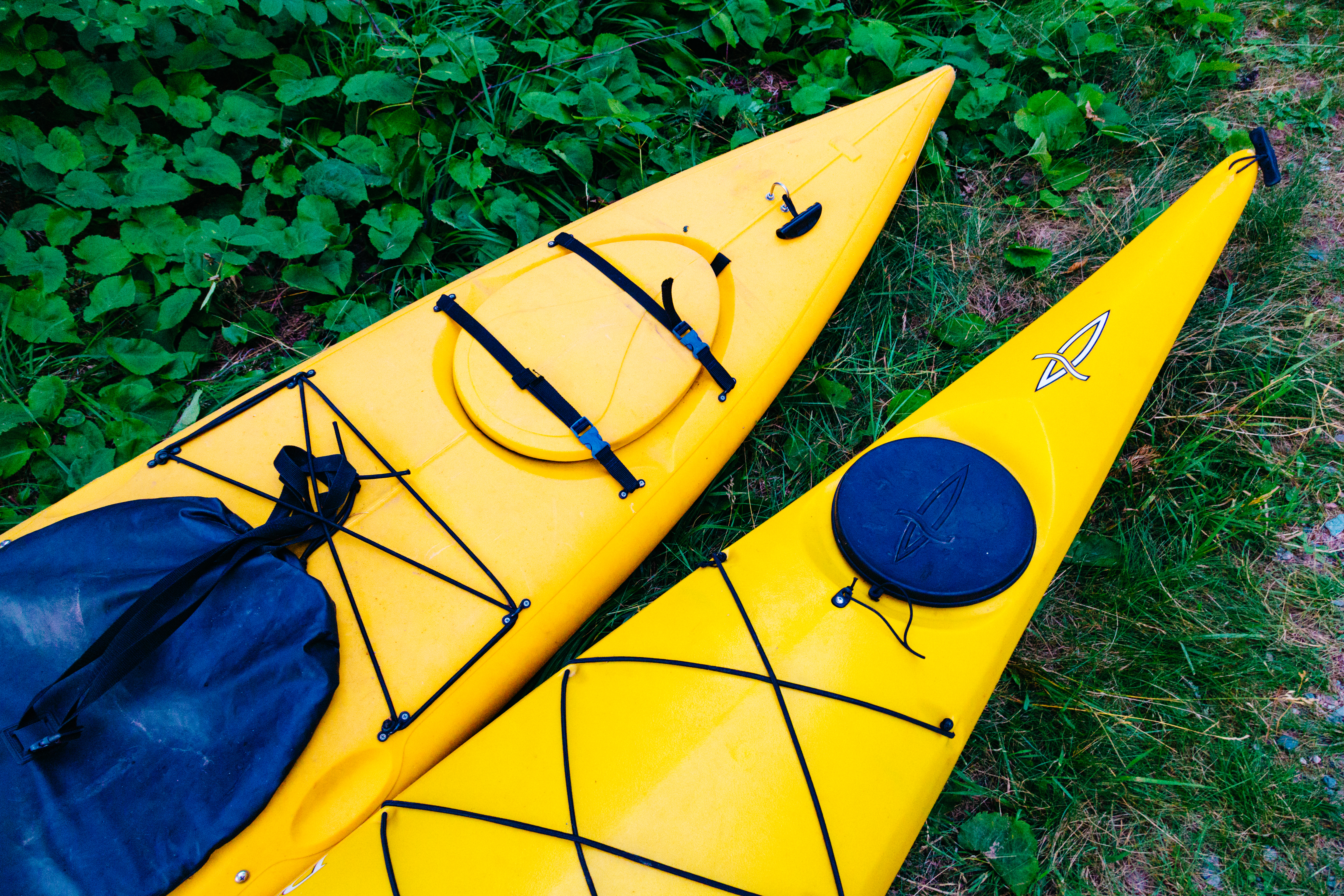Kayaks sit on the shore of Bear Head Lake at the Bear Head Lake State Park campground near Ely, Minnesota.