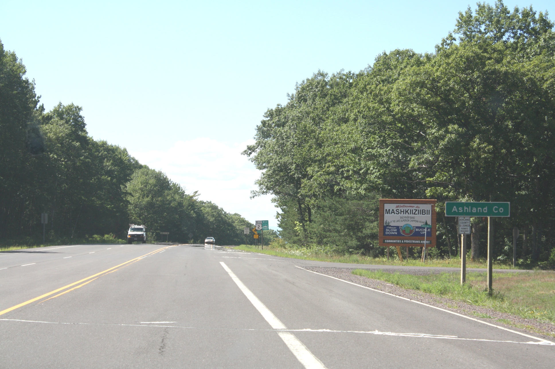The sign for w:Ashland County, Wisconsin on U.S. Route 2. It also marks the Bad River Indian Reservation and the sign for the Lake Superior Circle Tour is visible farther in the background.  This   file was uploaded  with Commonist.