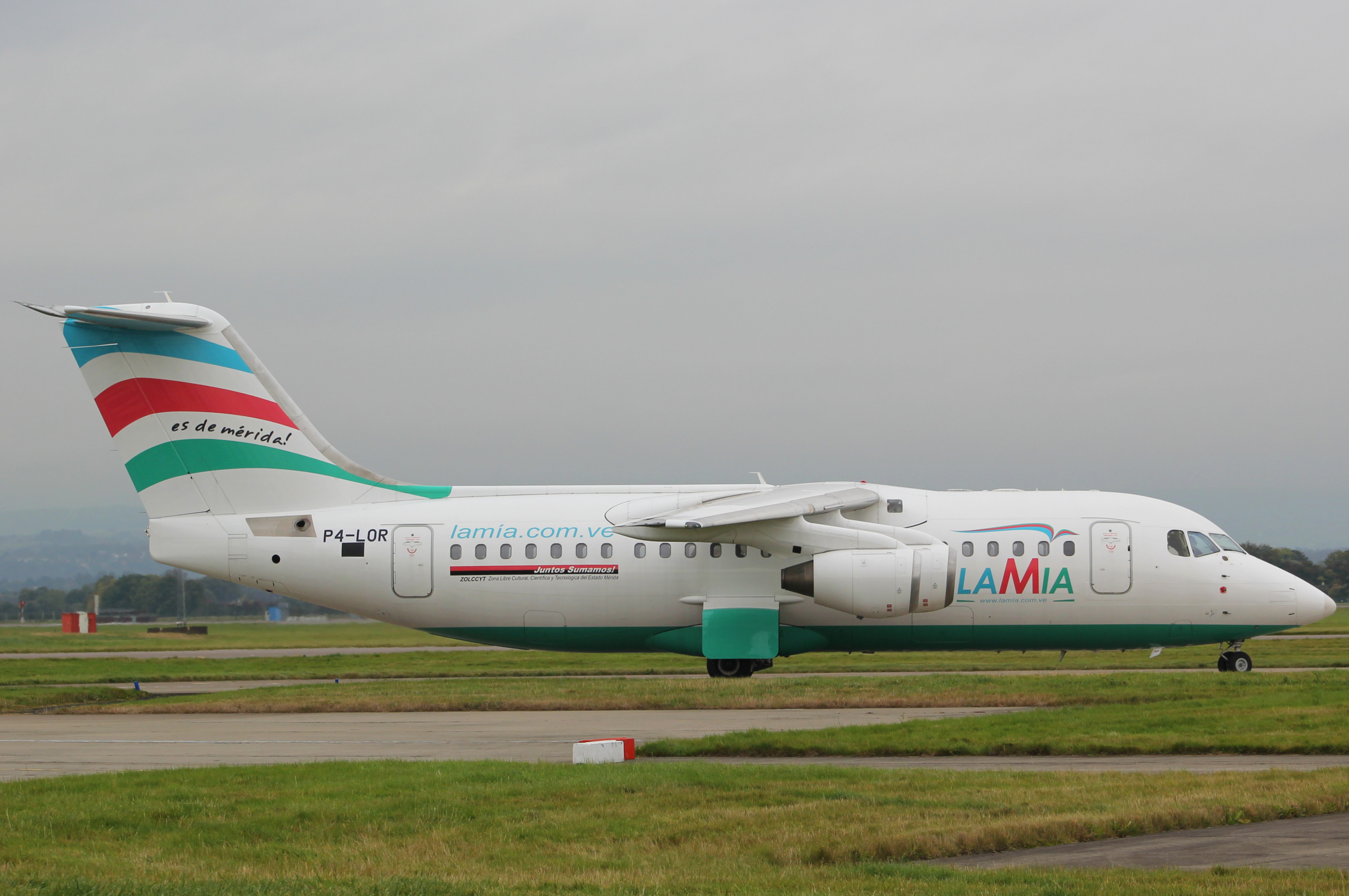 LaMia Avro RJ85 registered P4-LOR at Glasgow Airport, UK. This aircraft was registered as CP-2933 in January 2015 and crashed in the LaMia Airlines Flight 2933 accident in November 2016. Source