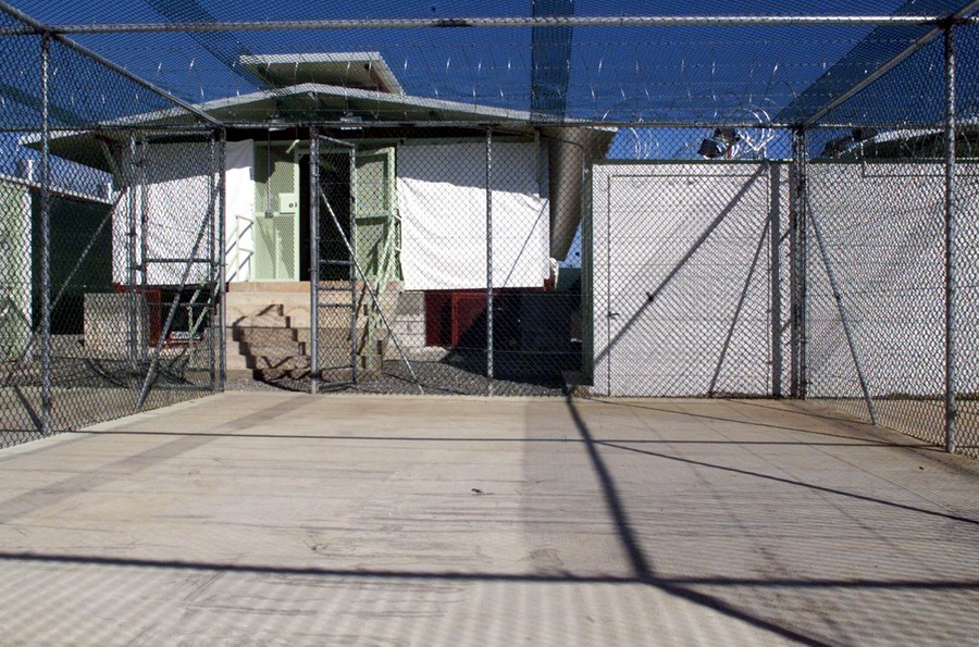 Original caption reads:
"A Camp Delta recreation and exercise area at Guantanamo Bay, Cuba. The detention block is shown with sunshades drawn on December 3, 2002. DoD photo by Staff Sgt. Stephen Lewald, U.S. Army. (Released)"
from...
source
